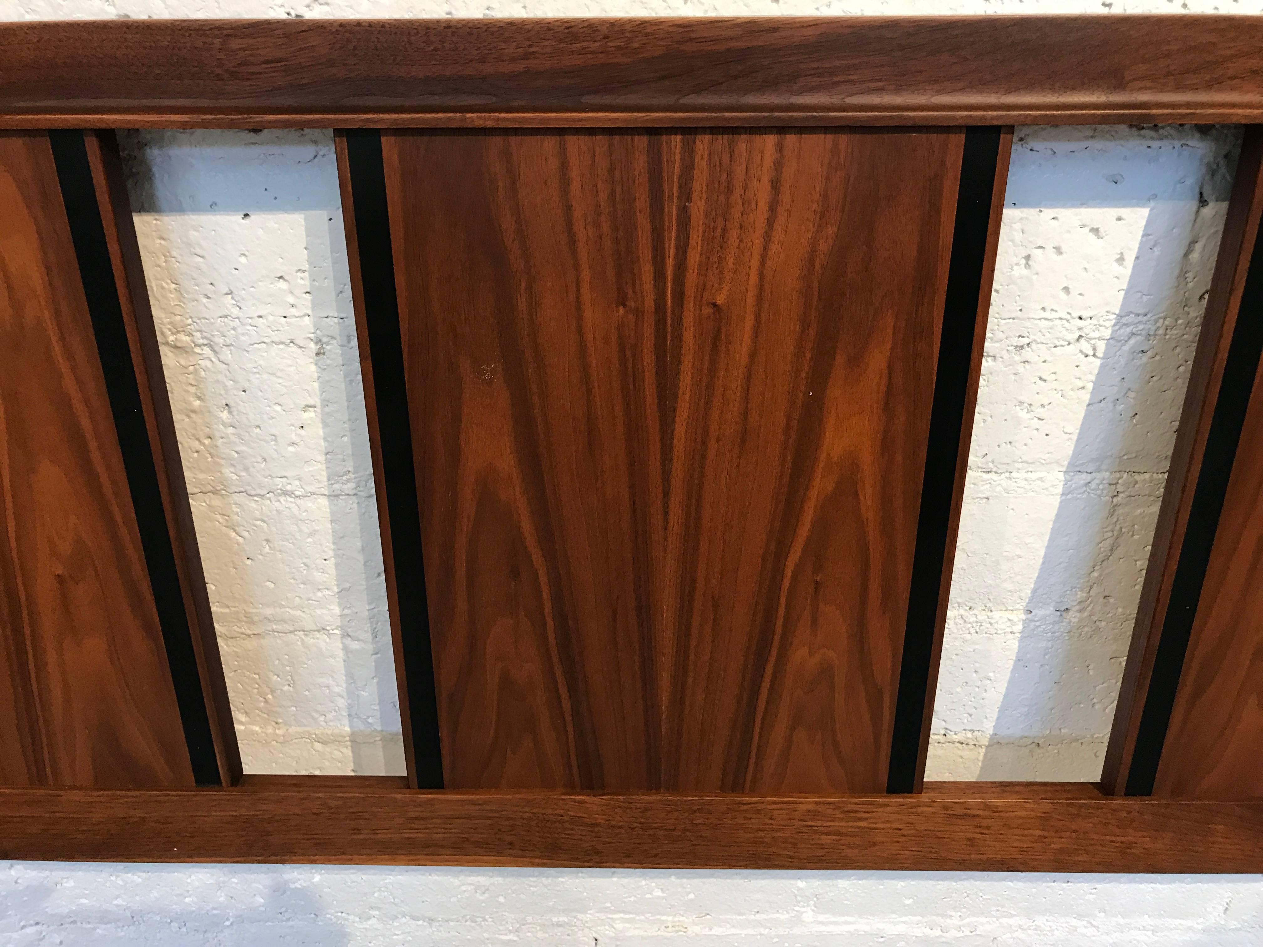 Out of a nice walnut bedroom set is this Dillingham king-size headboard. No bed frame just the walnut headboard. Age appropriate wear with scuffing and minor marks, abrasions and surface scratches.