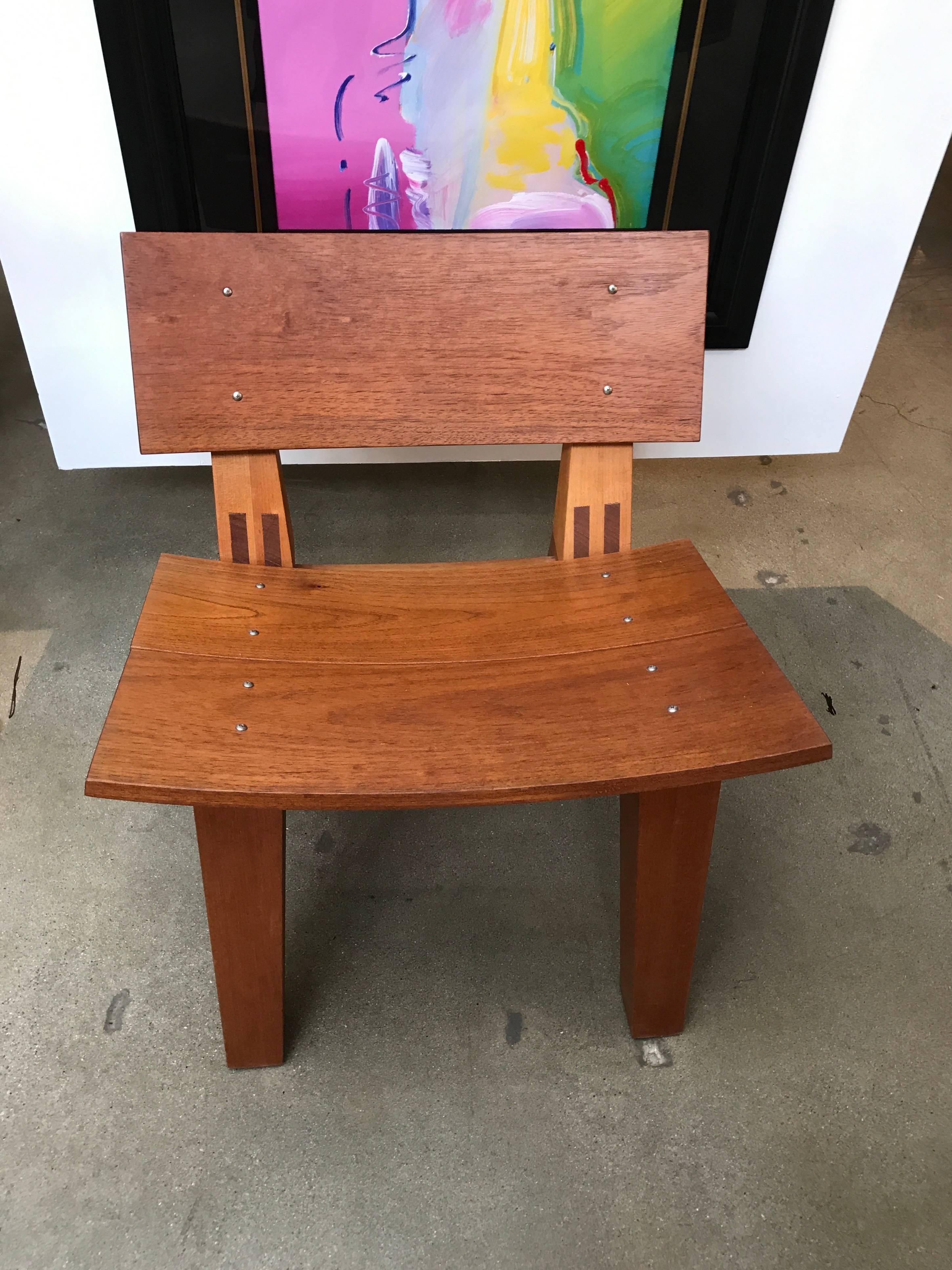 A unique prototype chair by the re-known architect and furniture designer Rob Edley Welborn. This chair eventually went into production in wood, but is no longer available. This one is hand built and it is surprisingly comfortable. The wood is