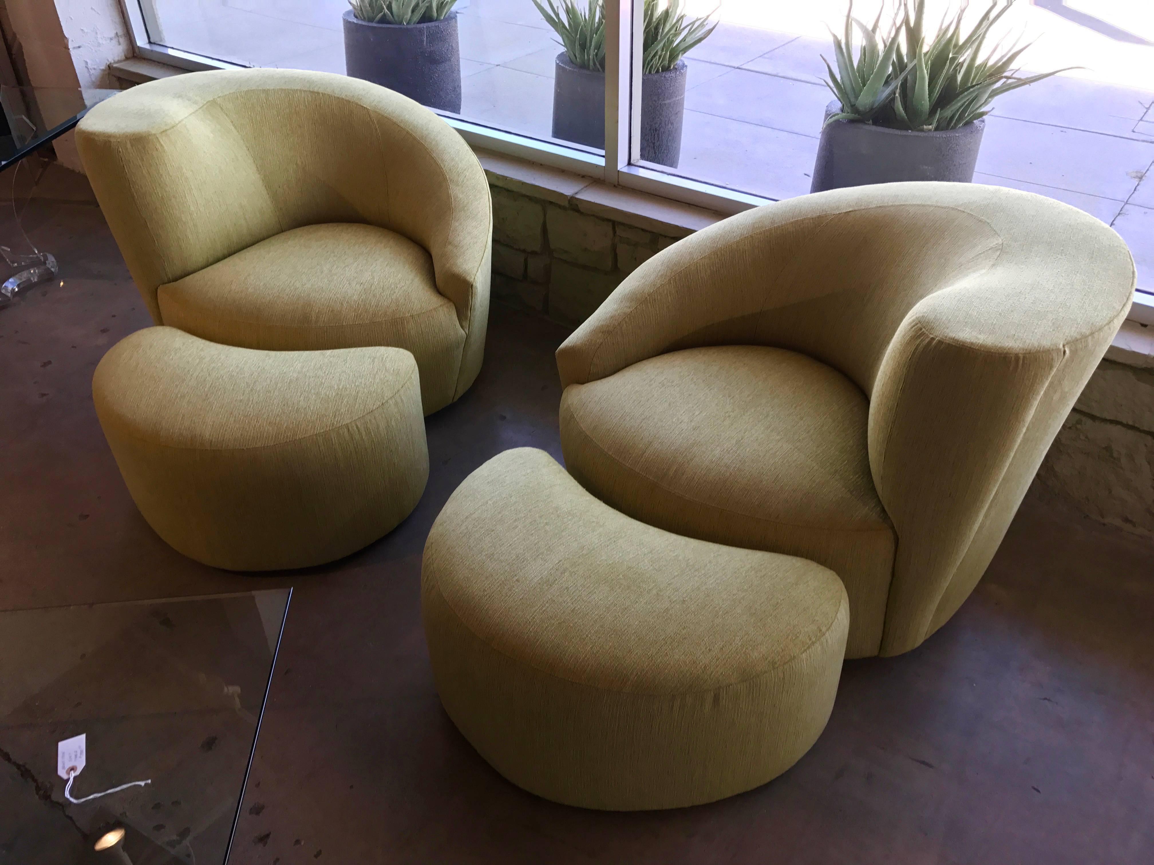 A newly upholstered pair of Vladimir Kagan nautilus chairs and matching ottomans. They have been redone in a beautiful Citrus Chenille fabric. The round swivel bases have been upholstered as well. Please note these are right and left pair. The