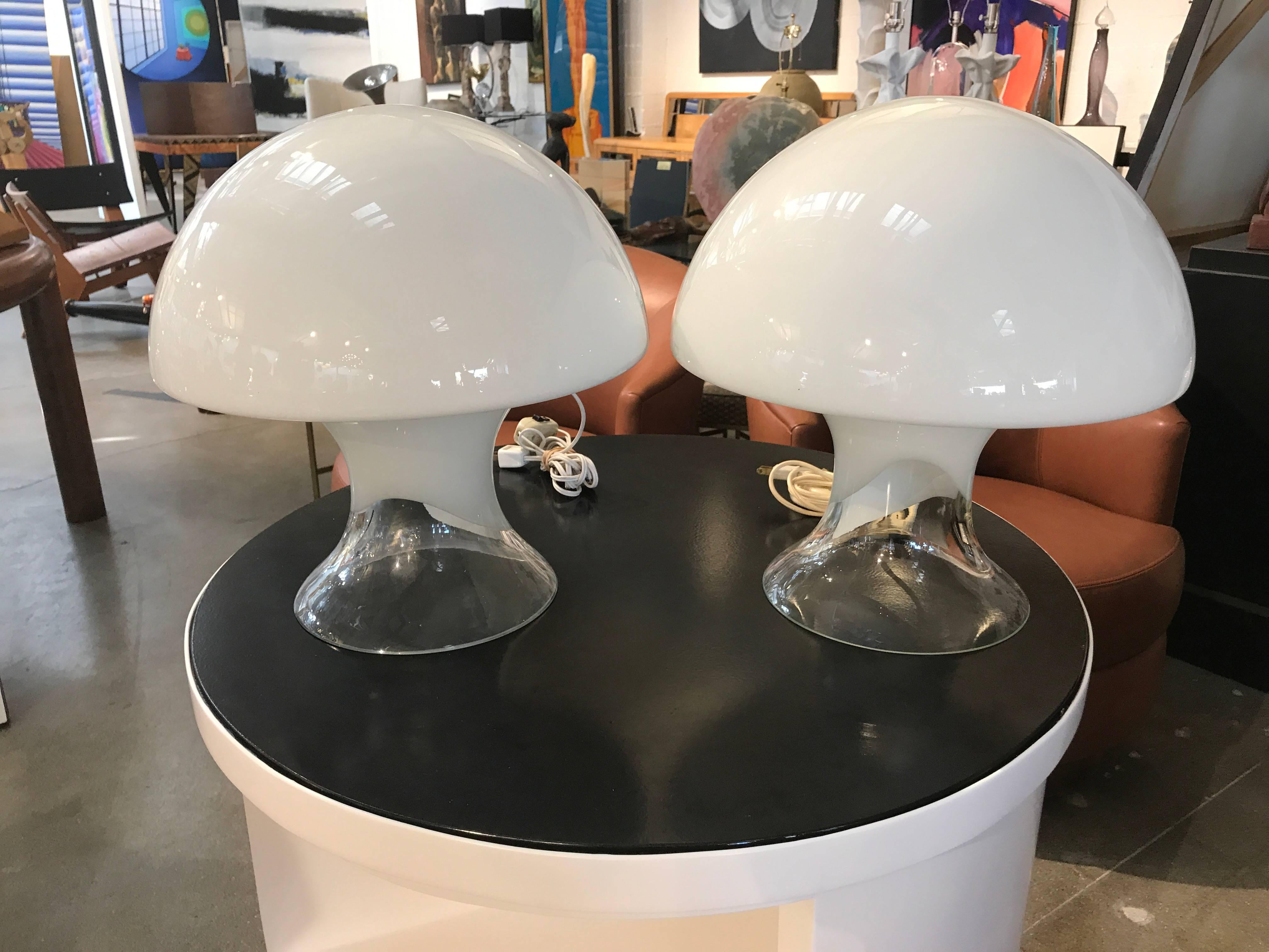 A pair of Murano Gino Vistosi mushroom lamps in working condition. new wire but we kept the on off switch to show their age. In good condition with no chips and only minor marks to glass.