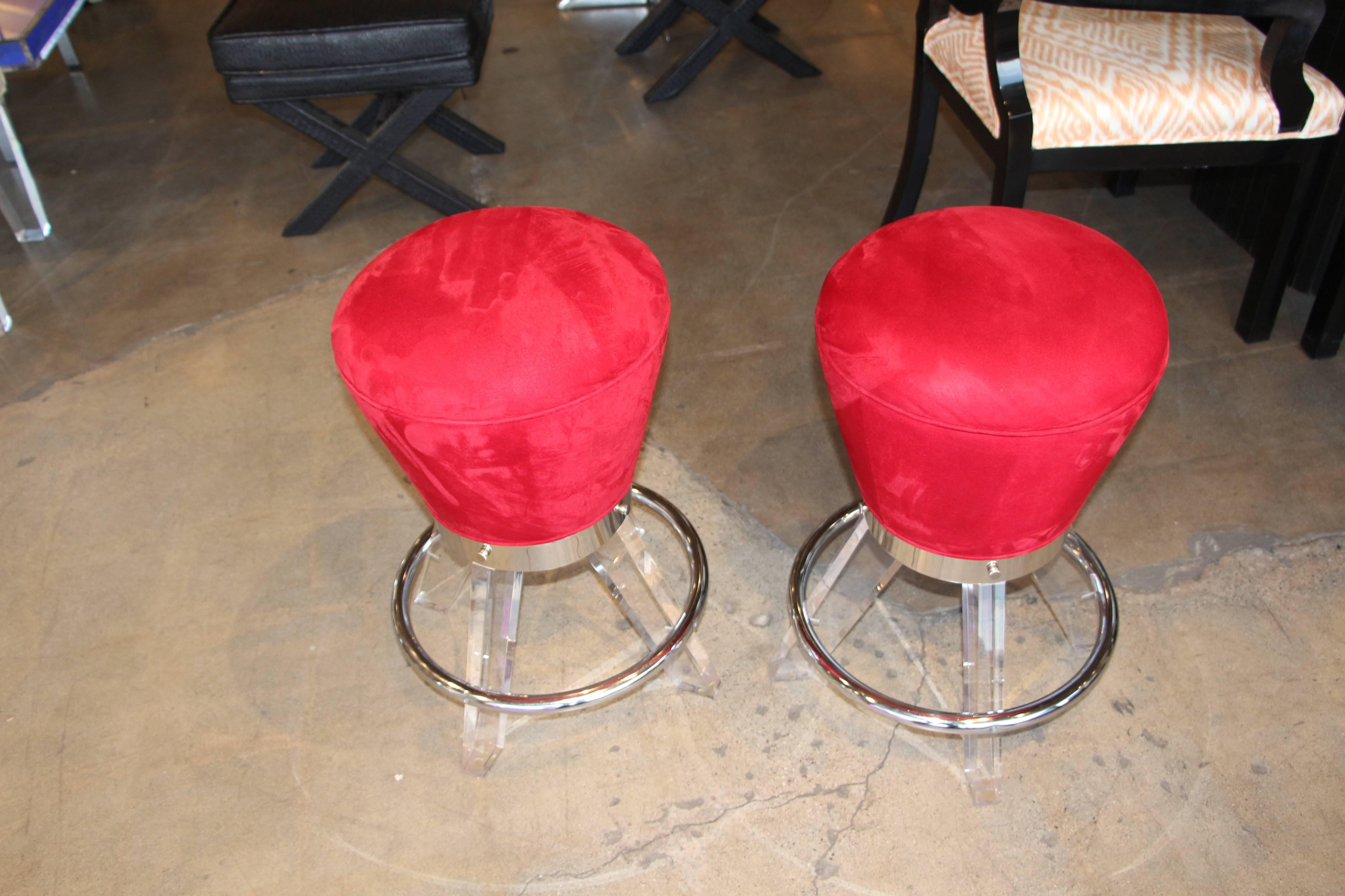 A nice pair of red upholstered Gumdrop stools made and designed by H studio designed by Haziza. They are quite striking and retain their original tags. There are some minor marks to the Lucite and chrome.