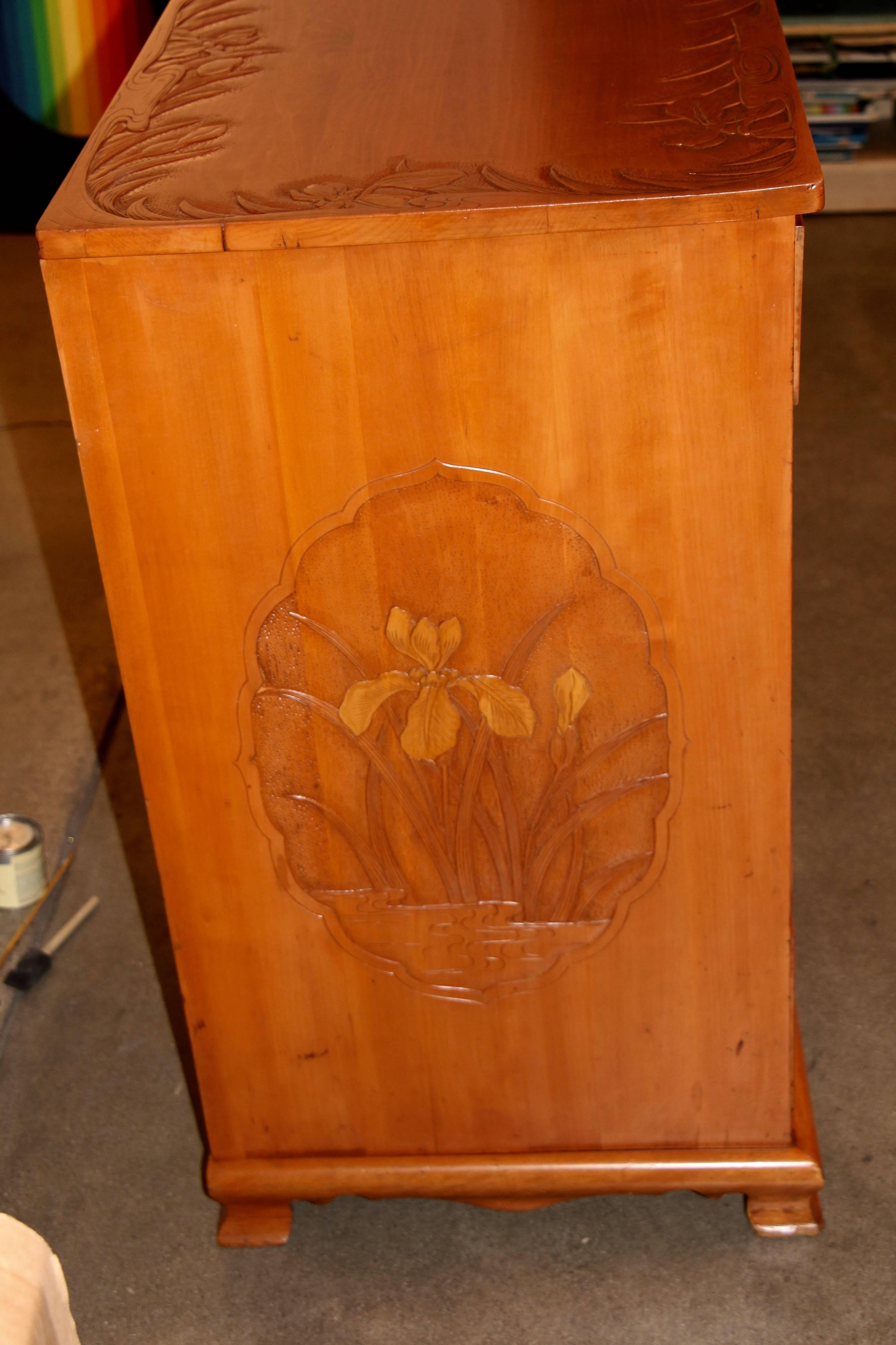 This and the matching nightstands were purchased from the estate of a couple who had a business in Japan before WW2. They had these pieces custom-made for them. While we tried to clean up this piece the drawers are still a little tough to move. A