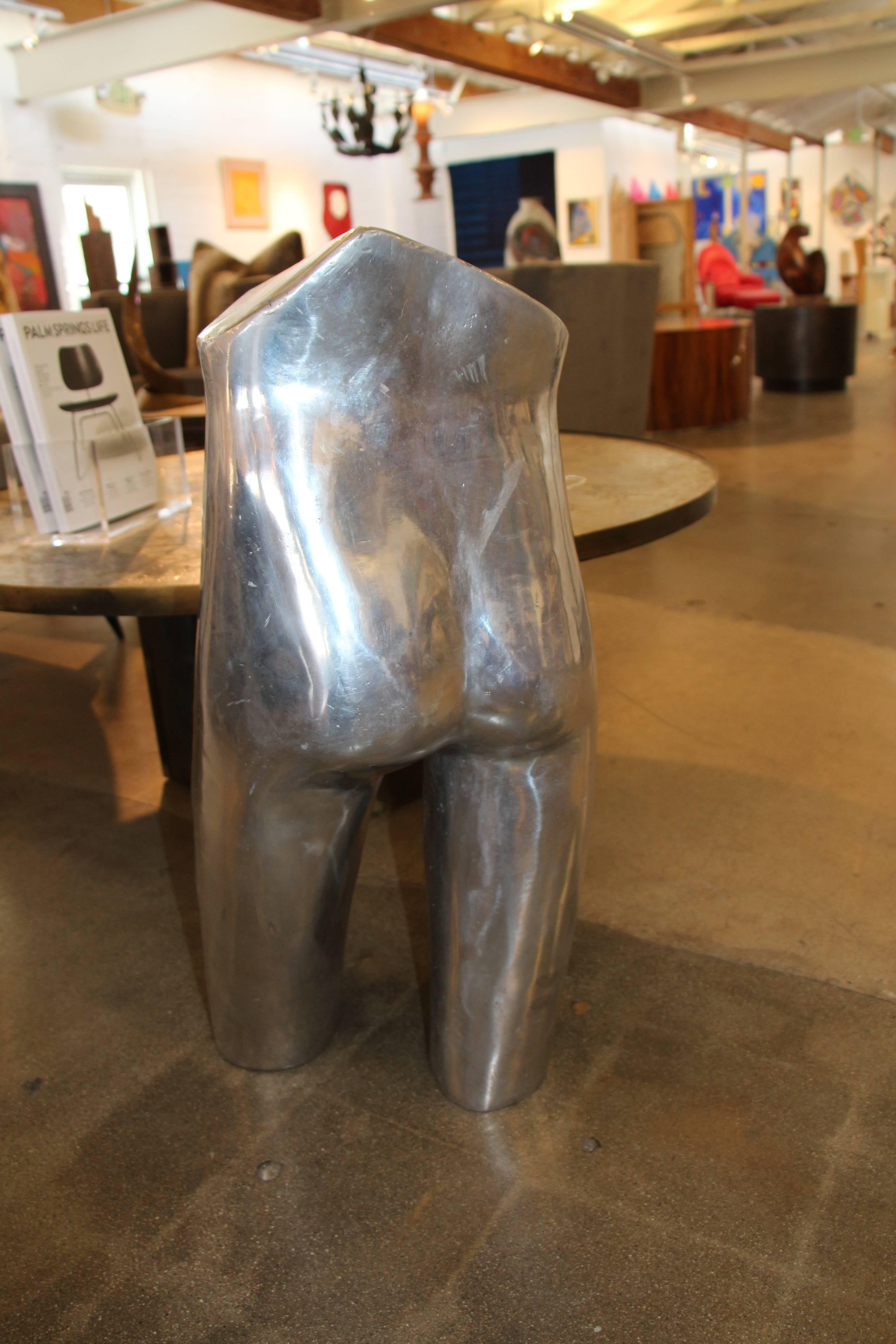 A nice torso cast of aluminium I believe in the form of a nude male. These appears to be a cast with quite a few repairs, see the detailed photos. Quite a few holes in the casting process. A nice sculpture.