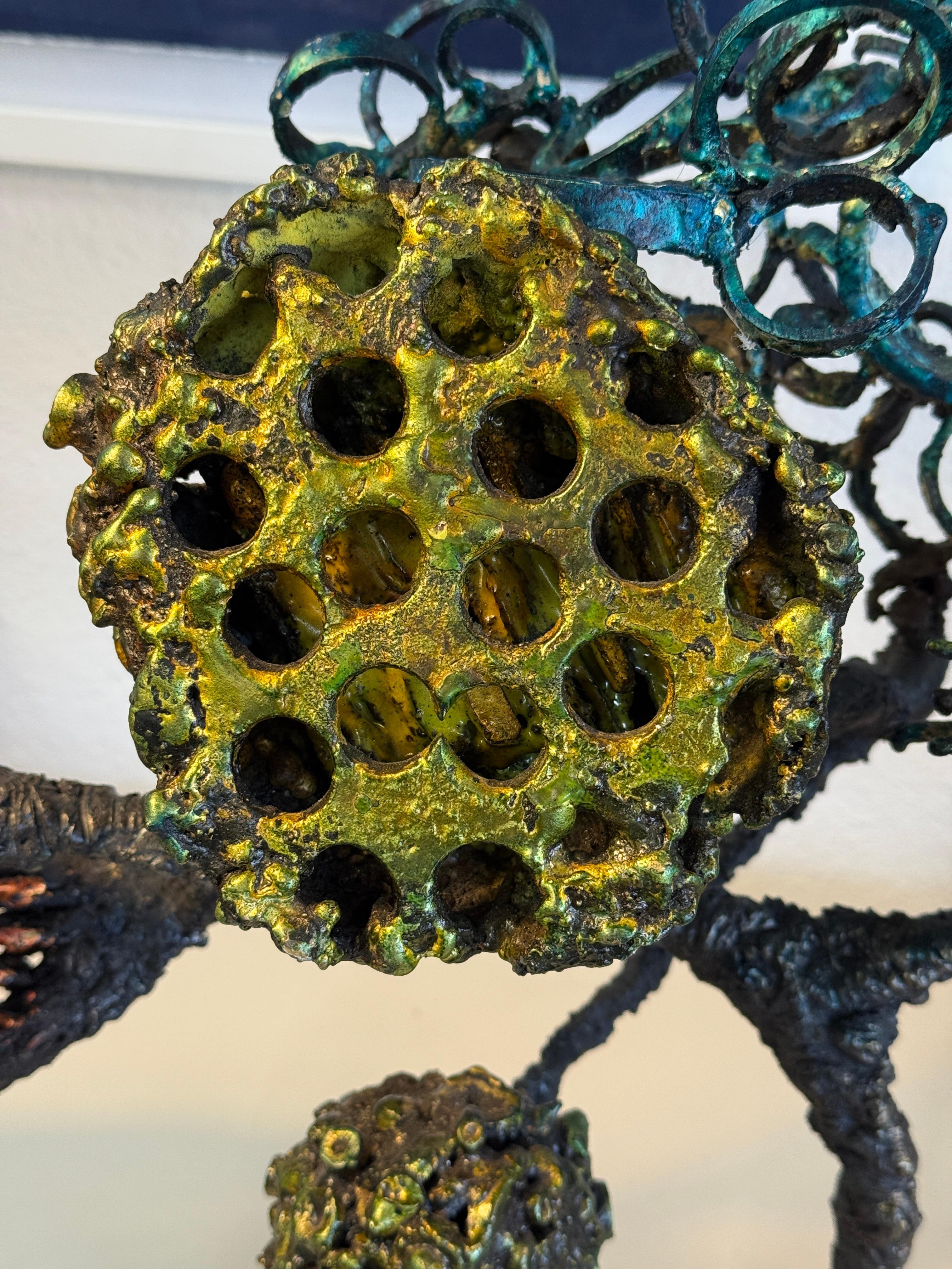 A wonderful brutalist blackened steel sculpture by the noted Des Moines Iowa artist, James Bearden. Done in 2022 the “Tree” features great color and form. Monogrammed on the bottom of the base.
In good overall condition 