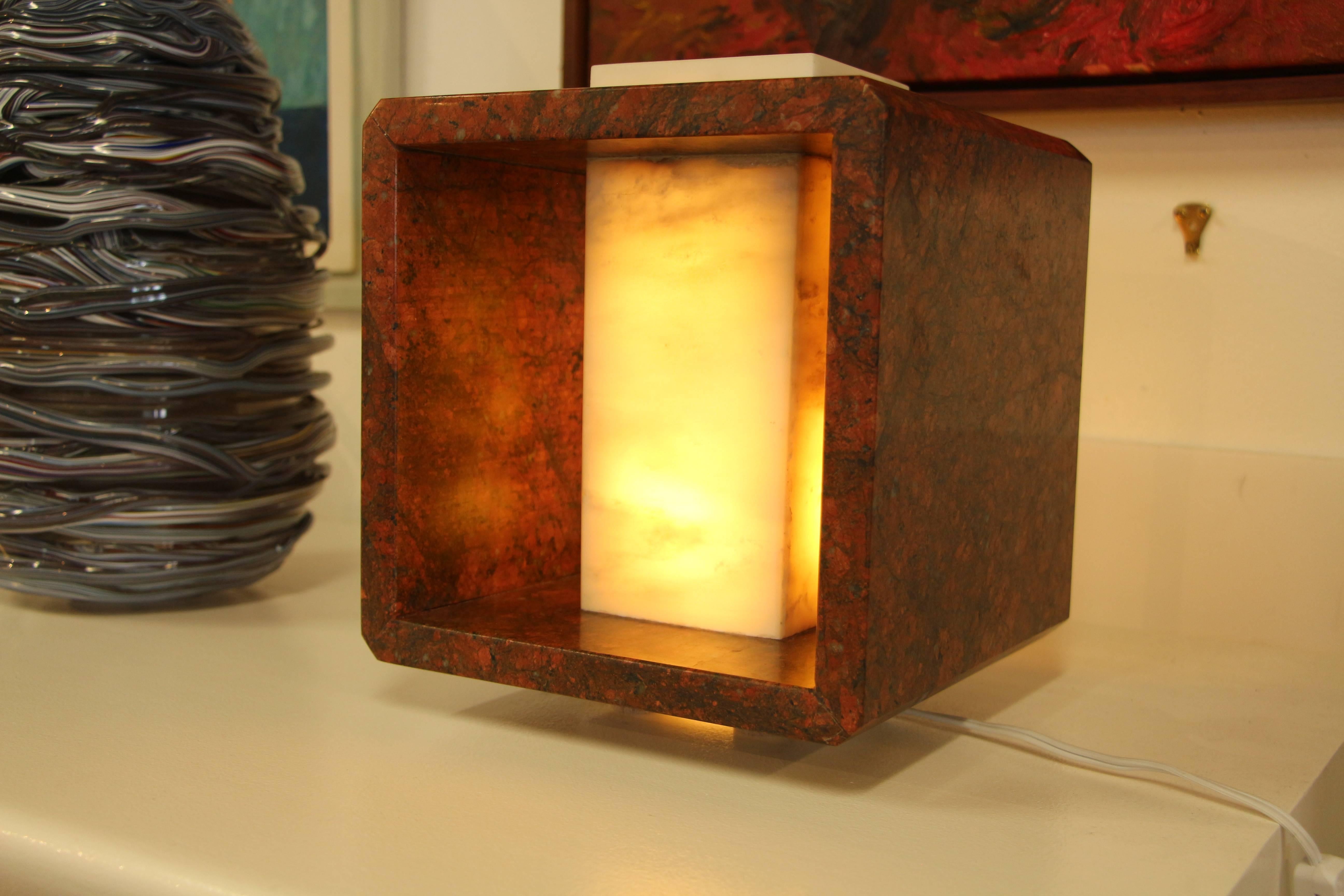 We recently started buying from a local artist Carlos Gaona, who is wonderfully talented. This lamp is a one-of-a-kind piece and is quite lovely. It is a nice red marble. New wiring of course.