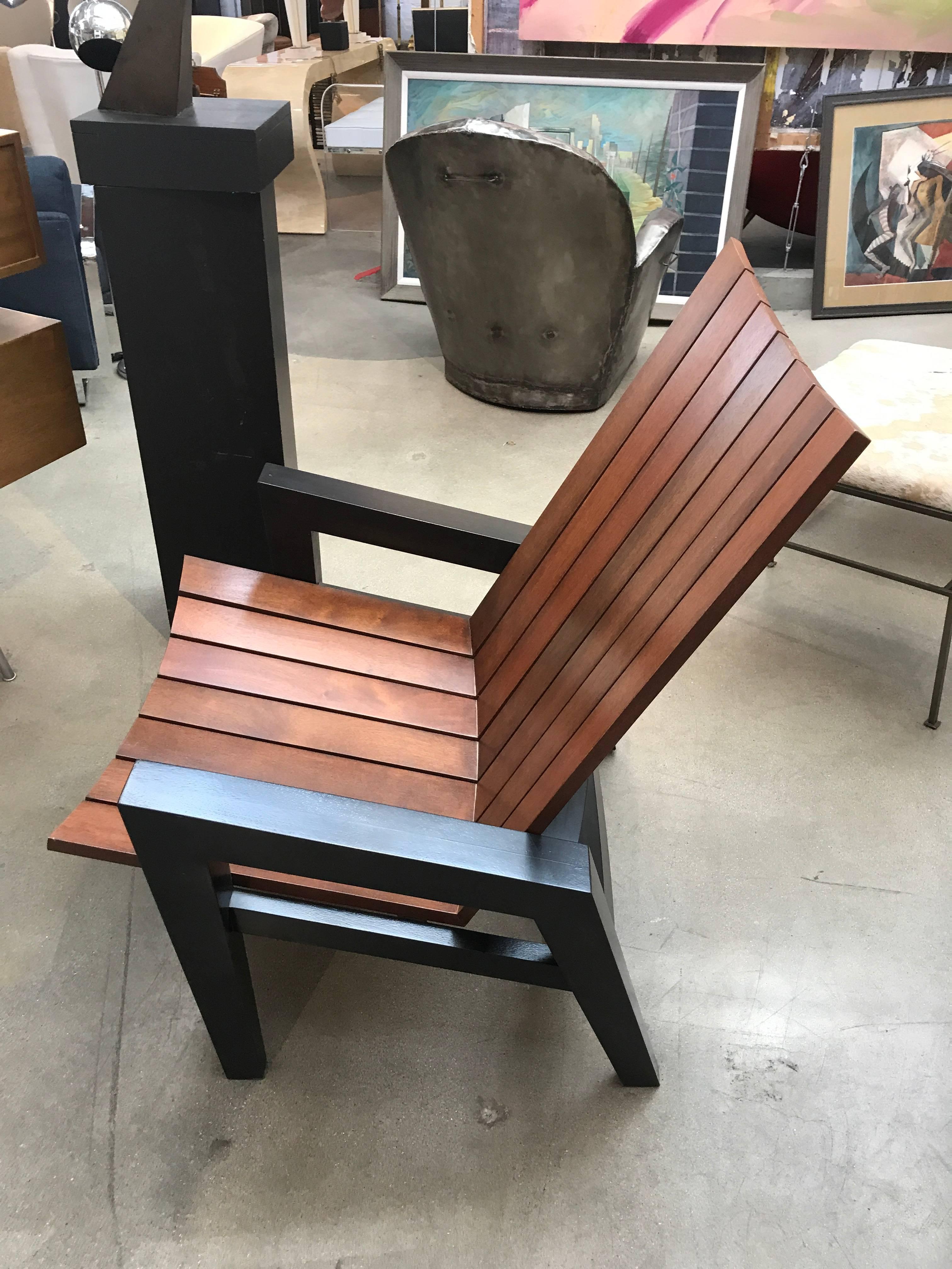 A unique prototype chair by the re-known architect and furniture designer Rob Edley Welborn. This chair never went into production and was built in his studio in New Mexico. It is surprisingly comfortable as well as being a sculptural beauty. It is
