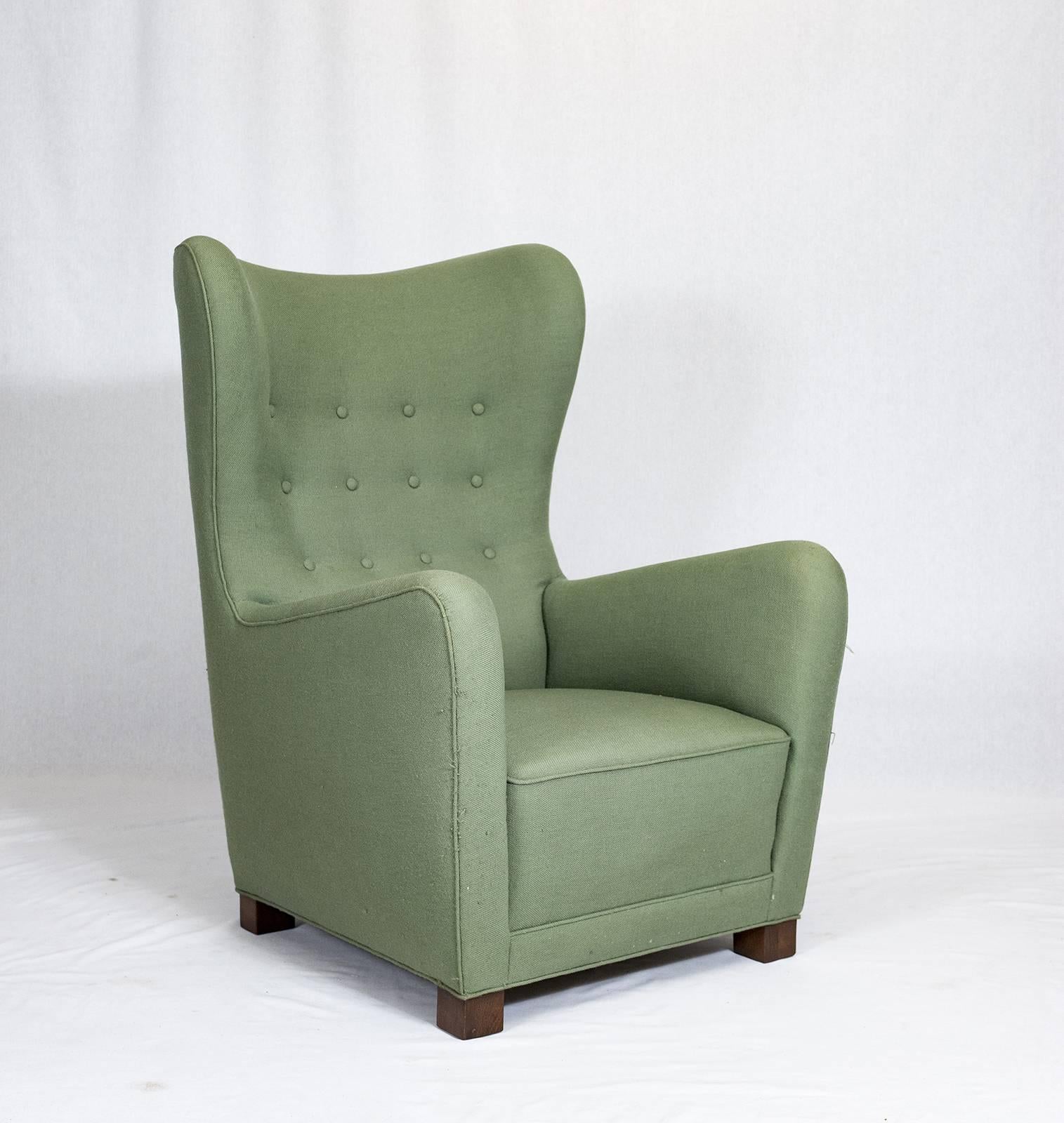 Fritz Hansen high back lounge chair model no.1672.     Store formerly known as ARTFUL DODGER INC