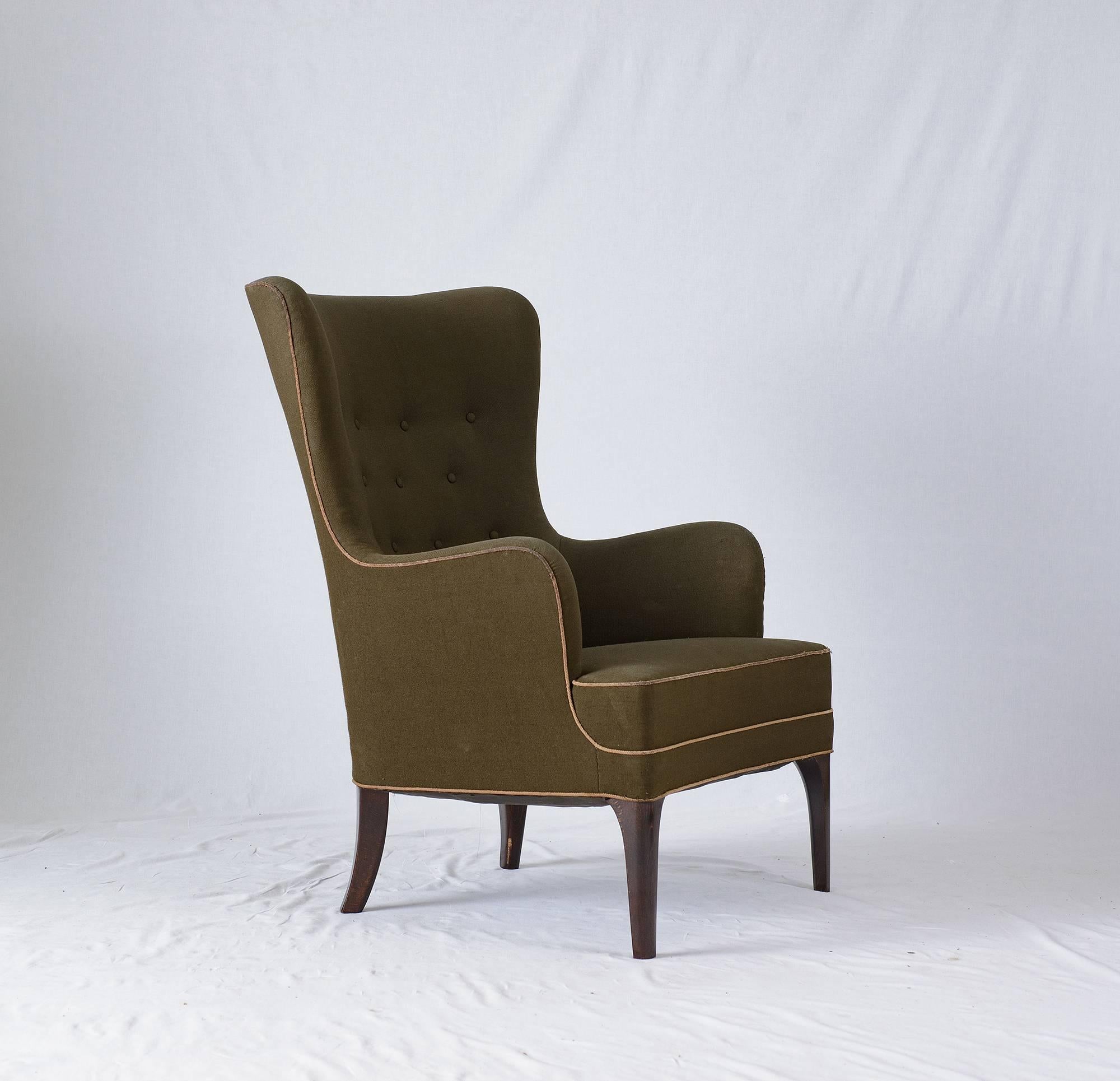 Frits Henningsen high back lounge chair.