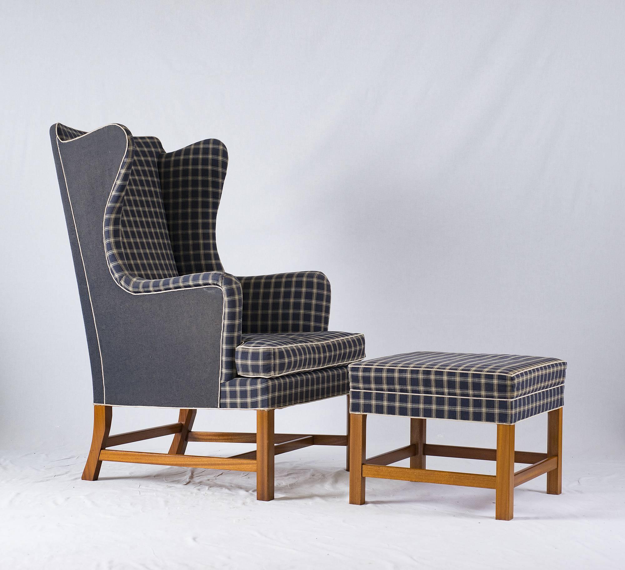 Kaare Klint wingback chair designed in 1941 and produced by Rud Rasmussen.
