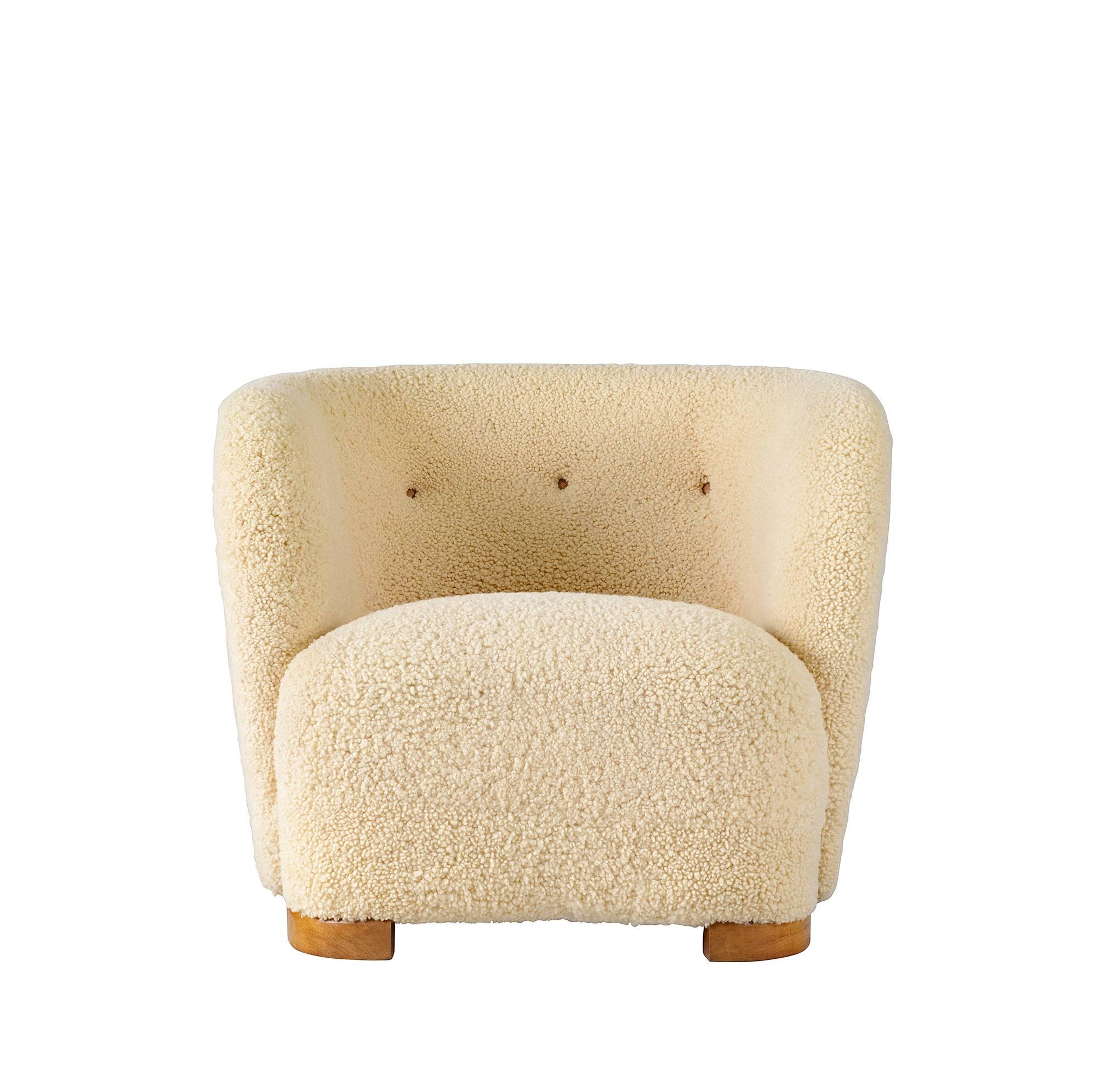 Pair of Scandinavian sheepskin lounge chairs.