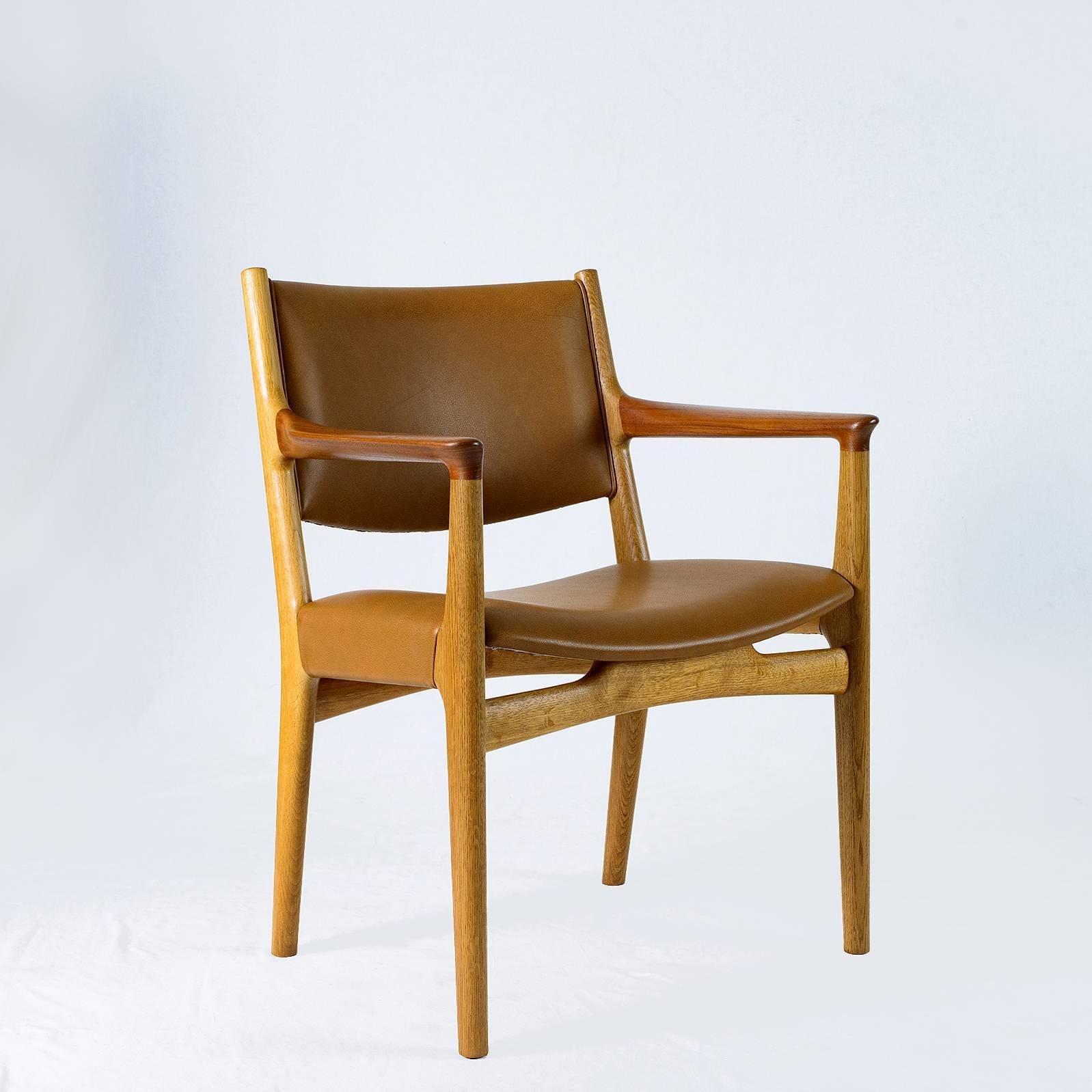Pair of Hans Wegner JH-525 armchairs designed in 1959 and produced by Johannes Hansen. Note: I have two more in need of reupholstering.