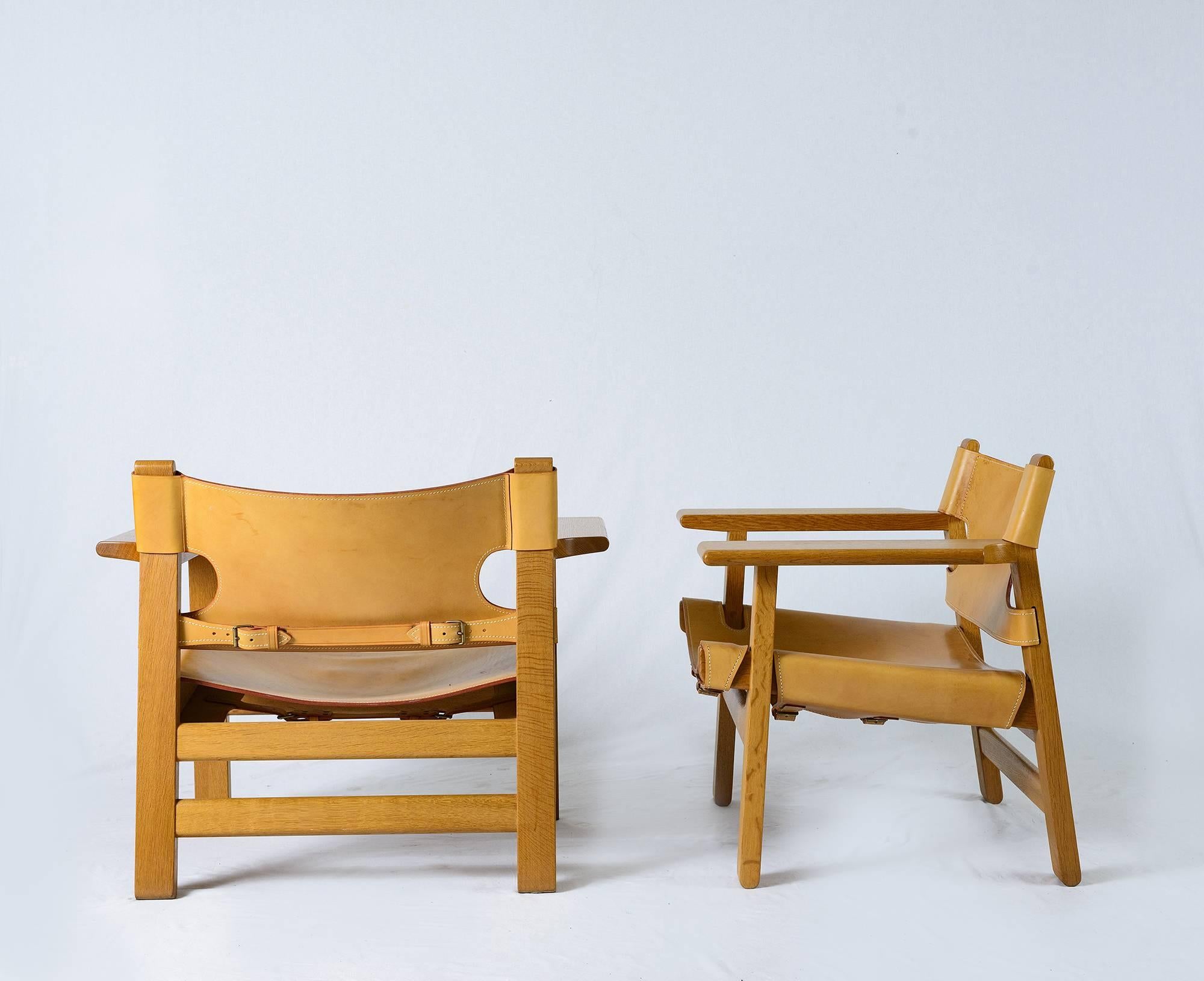 Pair of Børge Mogensen "Spanish" chairs designed in 1958 and produced by Fredericia Stolefabrik. Mogensen was inspired by a Spanish military commander's chair.