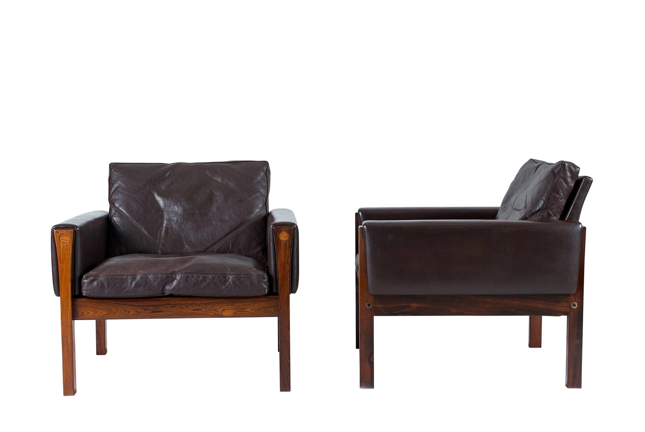 Pair of Hans Wegner AP 62 lounge chairs designed in 1960 and produced by A. P. Stolen.