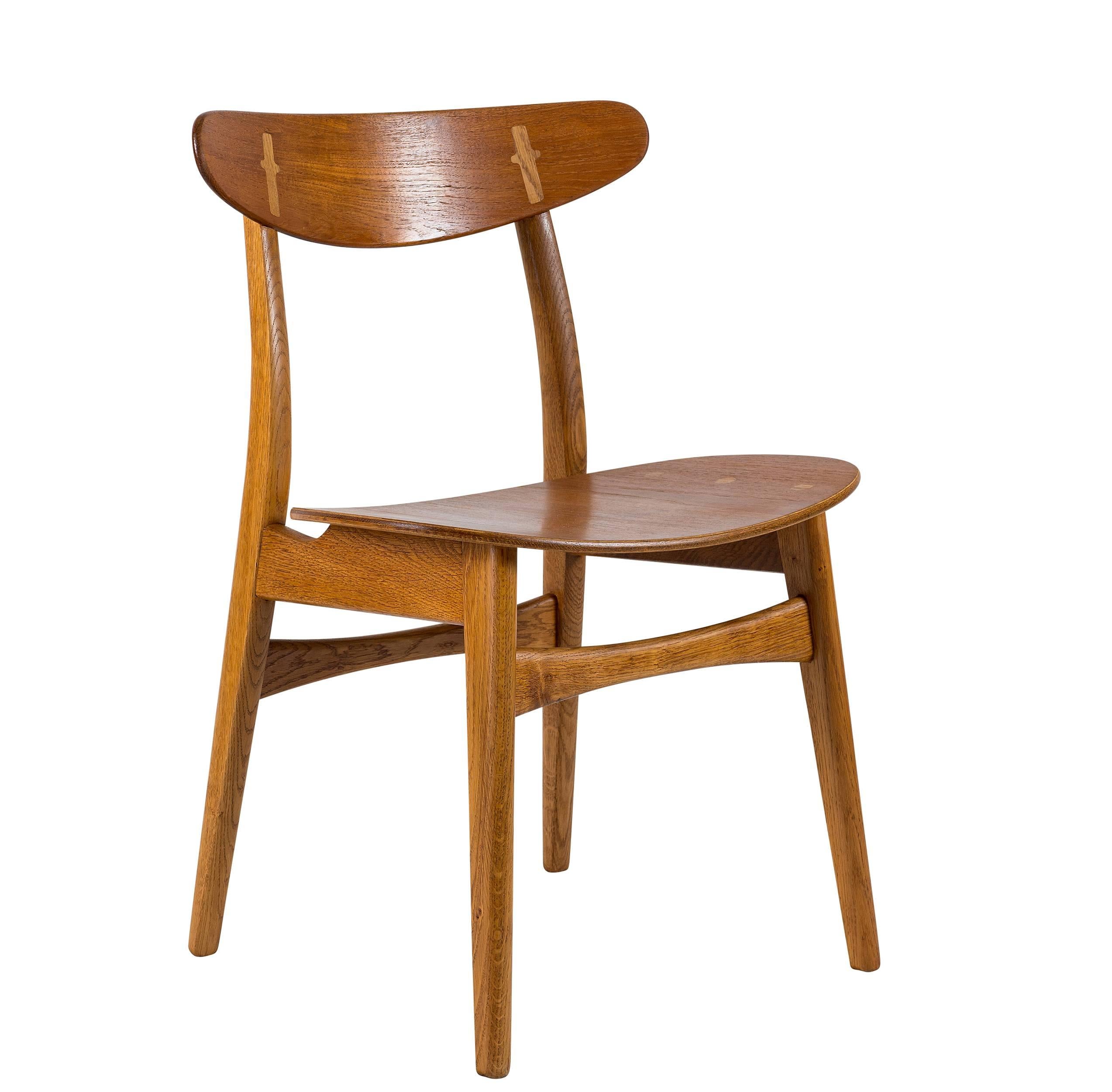 Set of eight Hans Wegner CH-30 dining chairs produced by Carl Hansen.