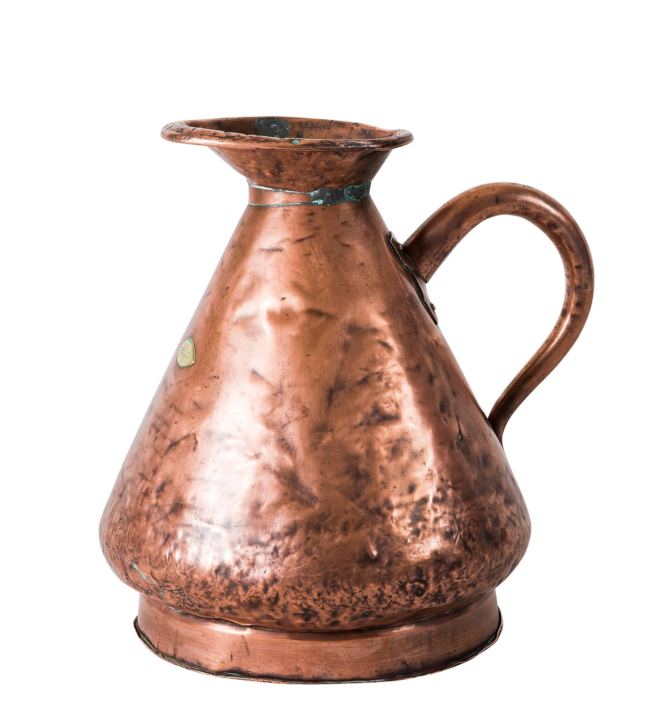 antique copper measuring jugs