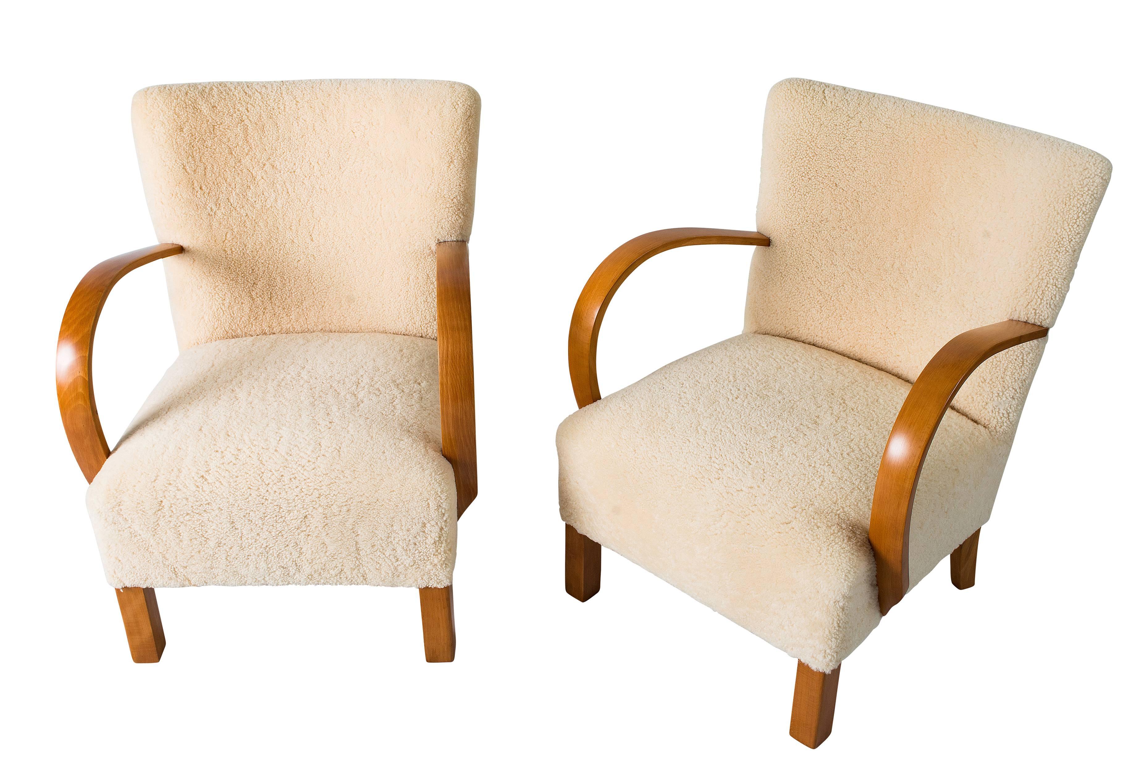 Mid-20th Century Pair of Scandinavian Sheepskin Lounge Chairs