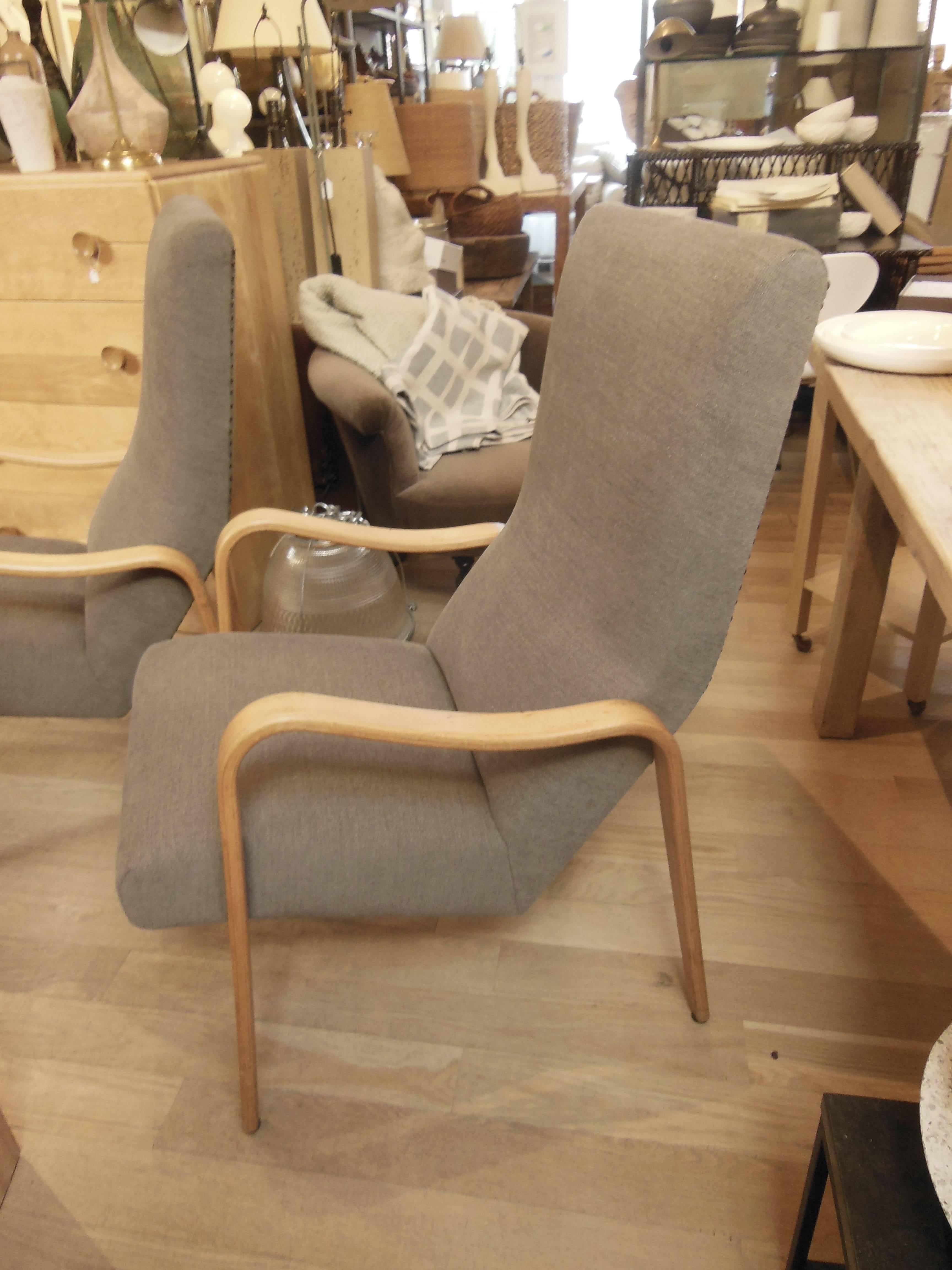 newly upholstered  pair of armchairs in the style of Alto