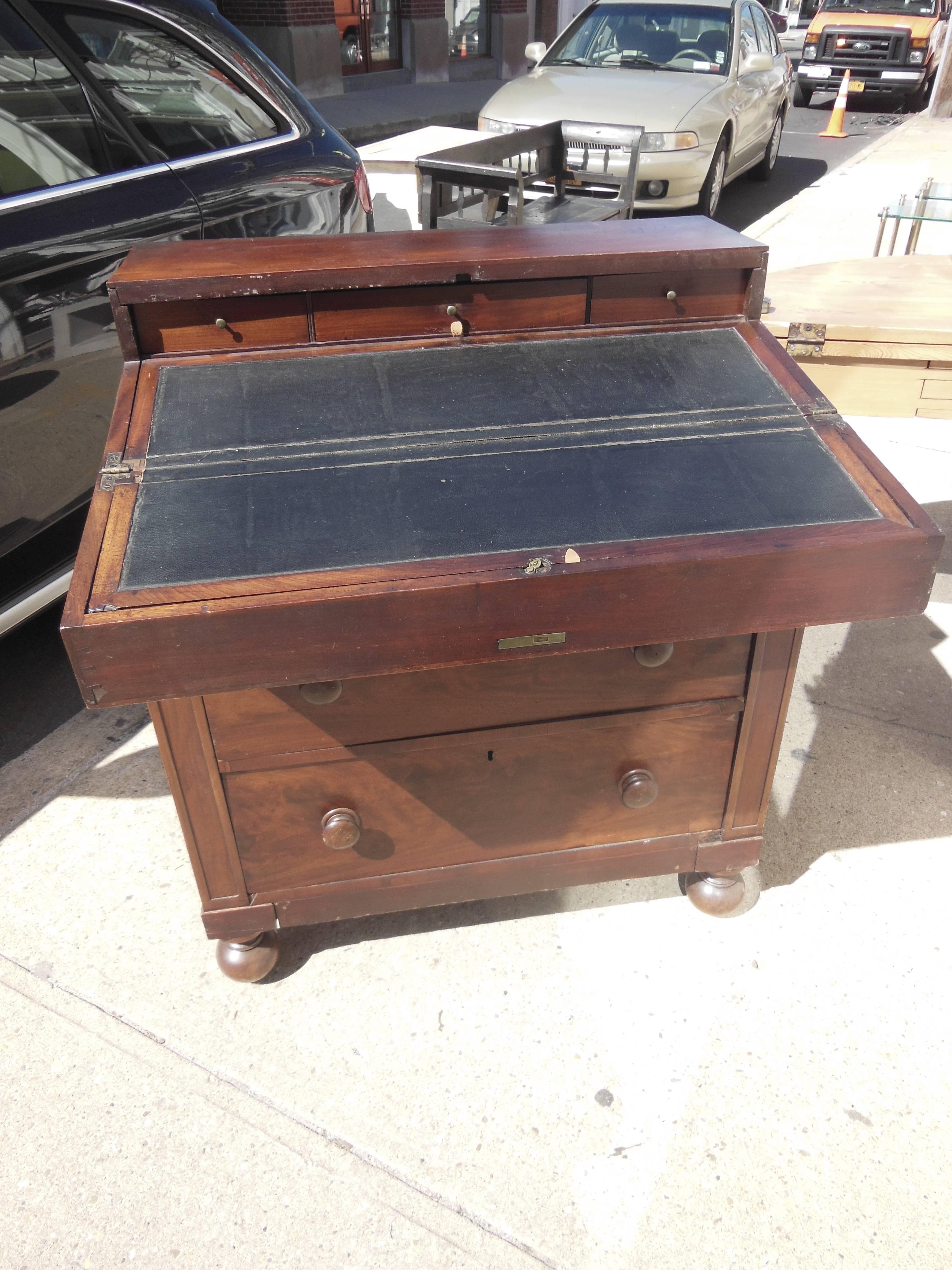 Very handsome captains desk with some repairs.