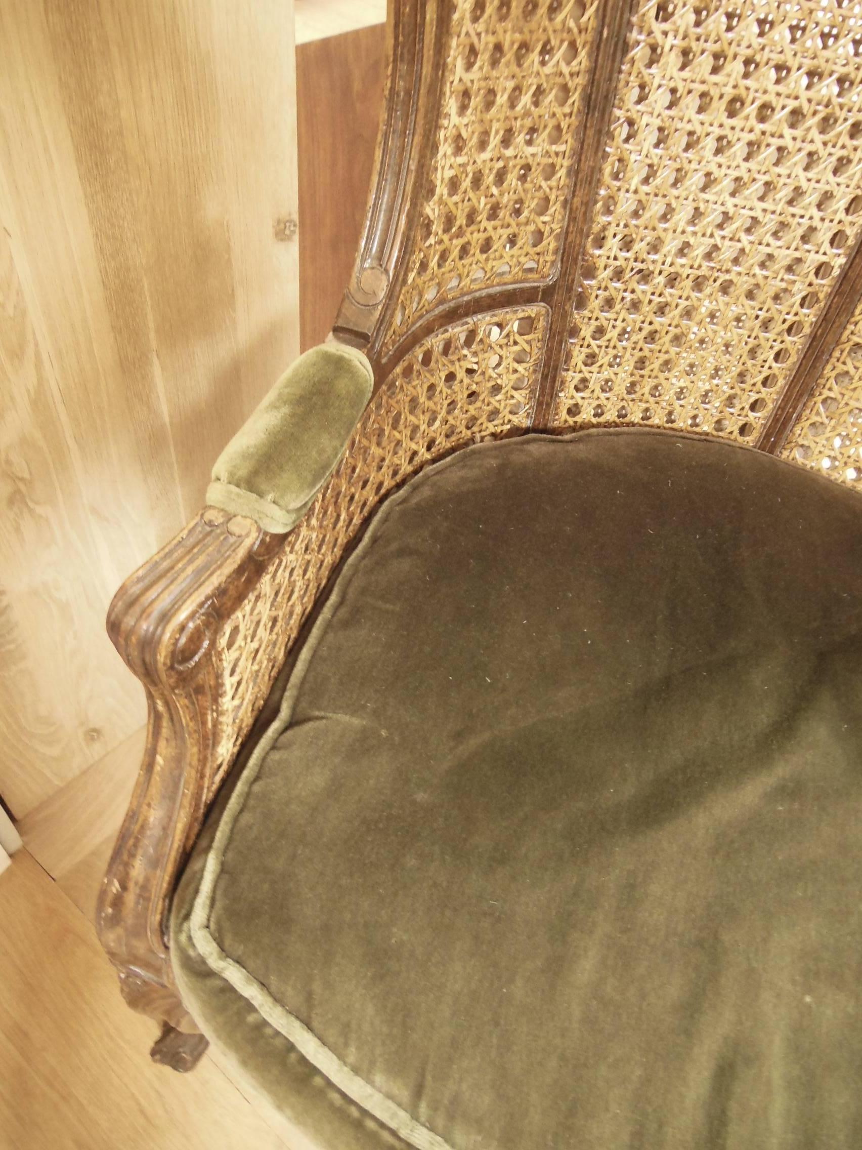 Vintage French Caned Hooded Armchair In Excellent Condition For Sale In Sag Harbor, NY