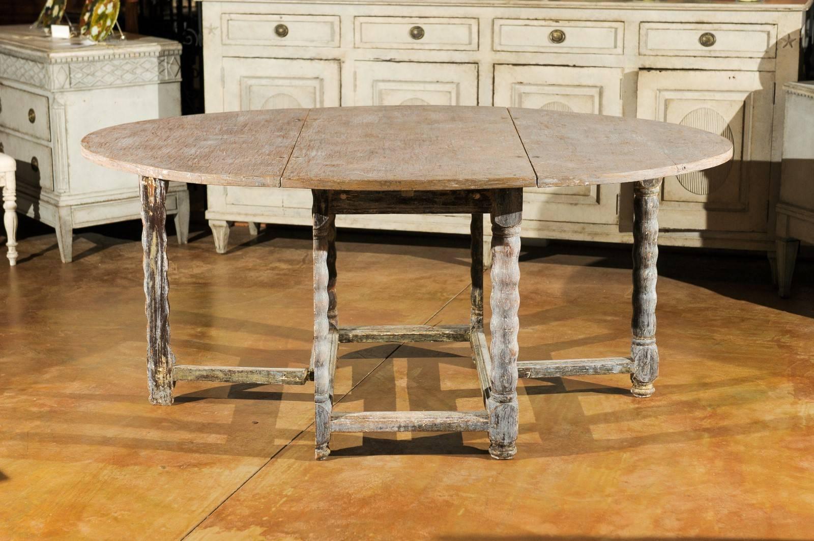 Swedish 18th century gate table with later paint. Measures: Table is 25.75" deep when closed.