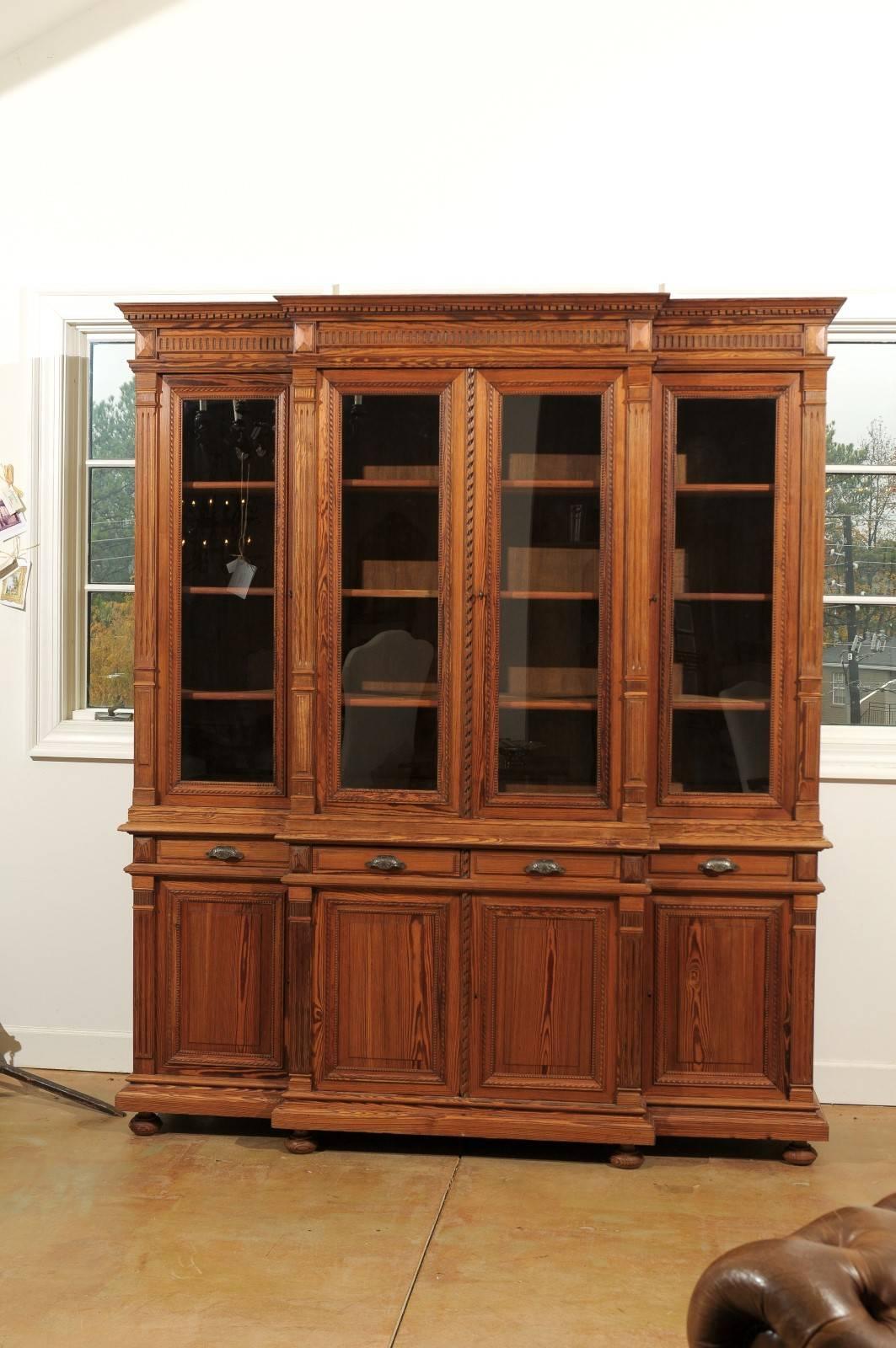 Neoclassical French Pitch Pine Glass Doors Breakfront Bookcase from the Turn of the Century