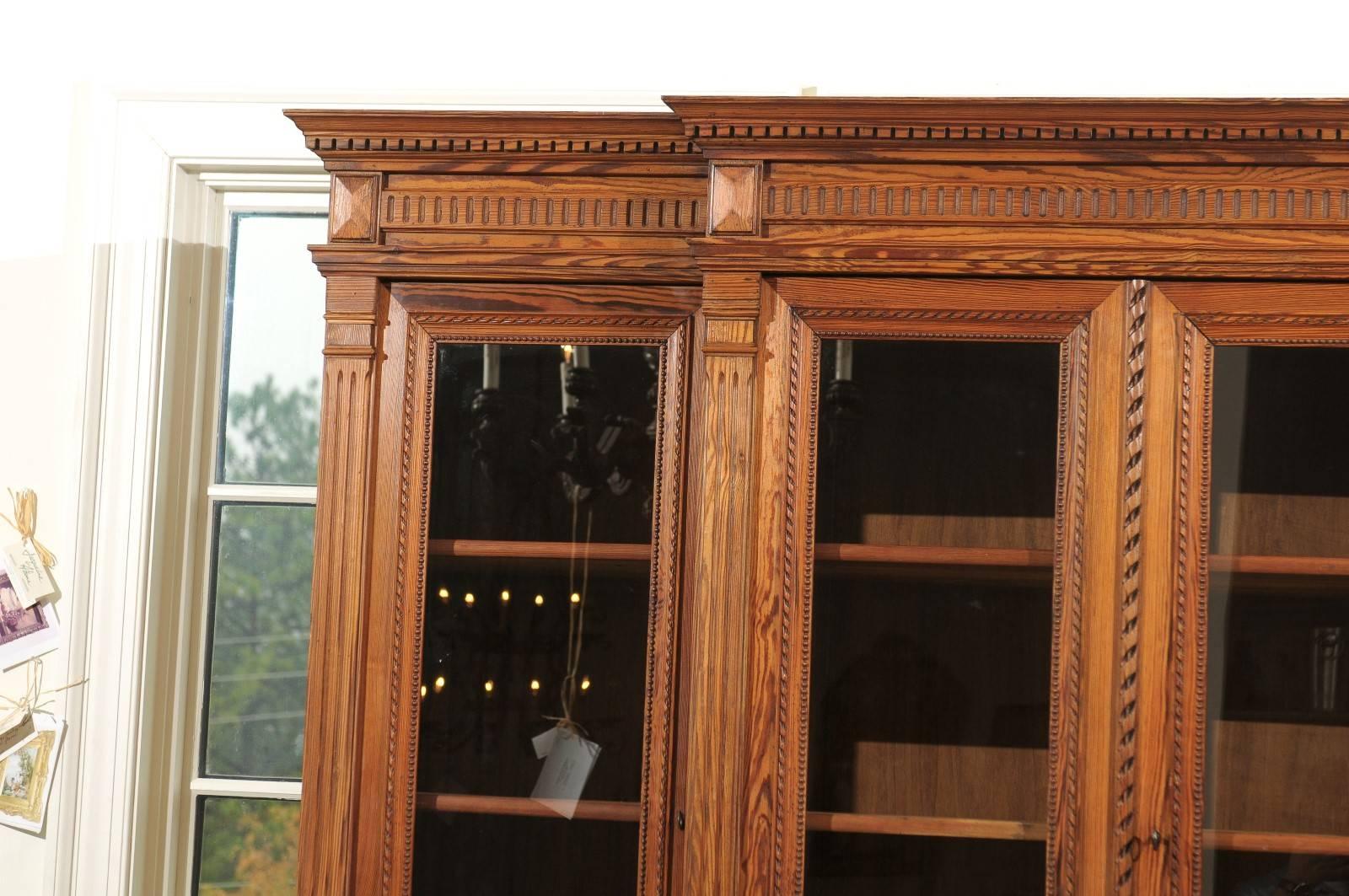 French Pitch Pine Glass Doors Breakfront Bookcase from the Turn of the Century In Good Condition In Atlanta, GA