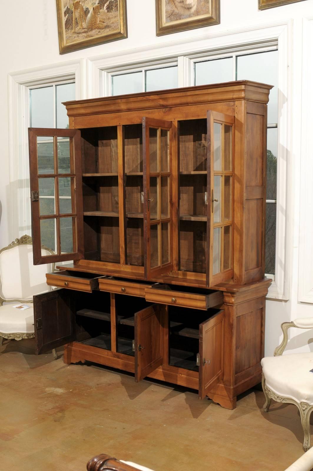 French 1900s Cherry Wood Two Part Cabinet with Inset Glass Doors and Drawers In Good Condition In Atlanta, GA