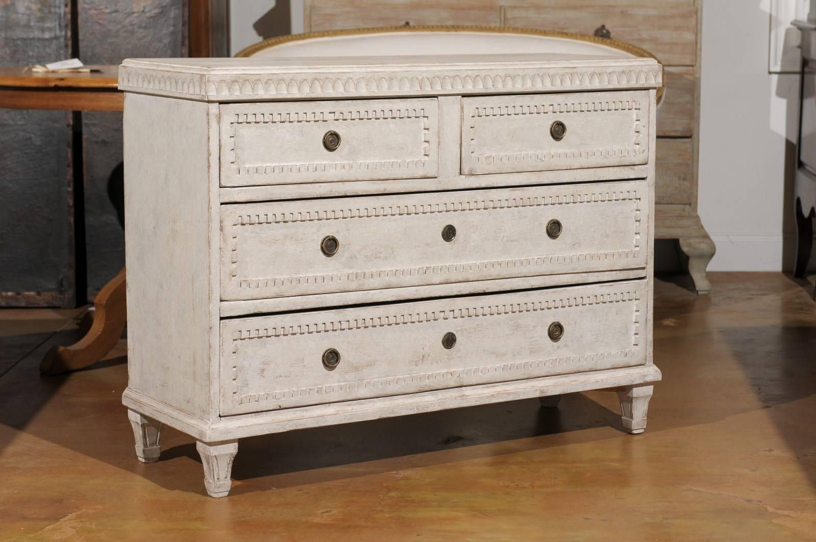 Swedish 19th century painted commode with four drawers.