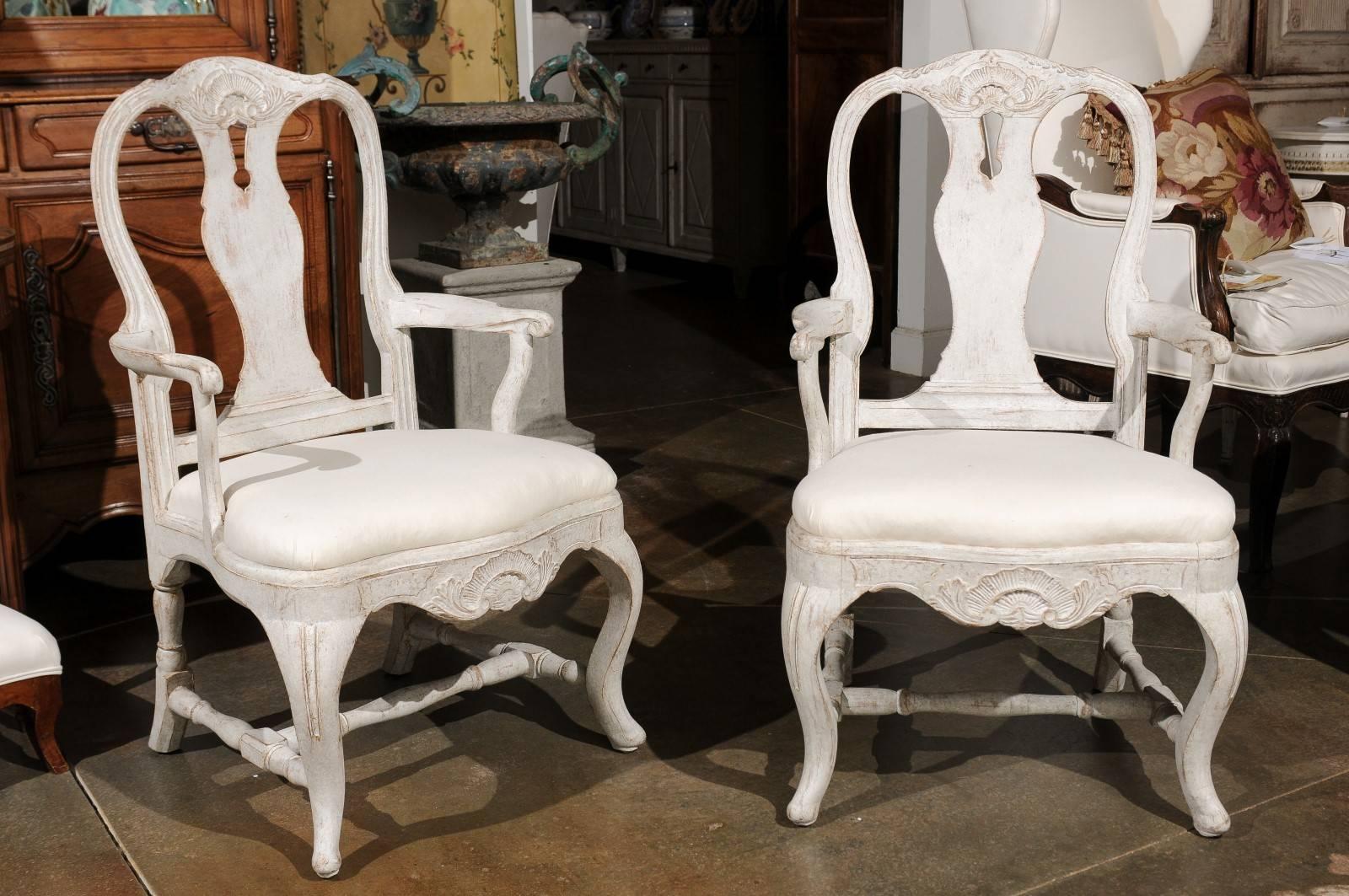 Swedish late 19th century armchairs in the Rococo style.