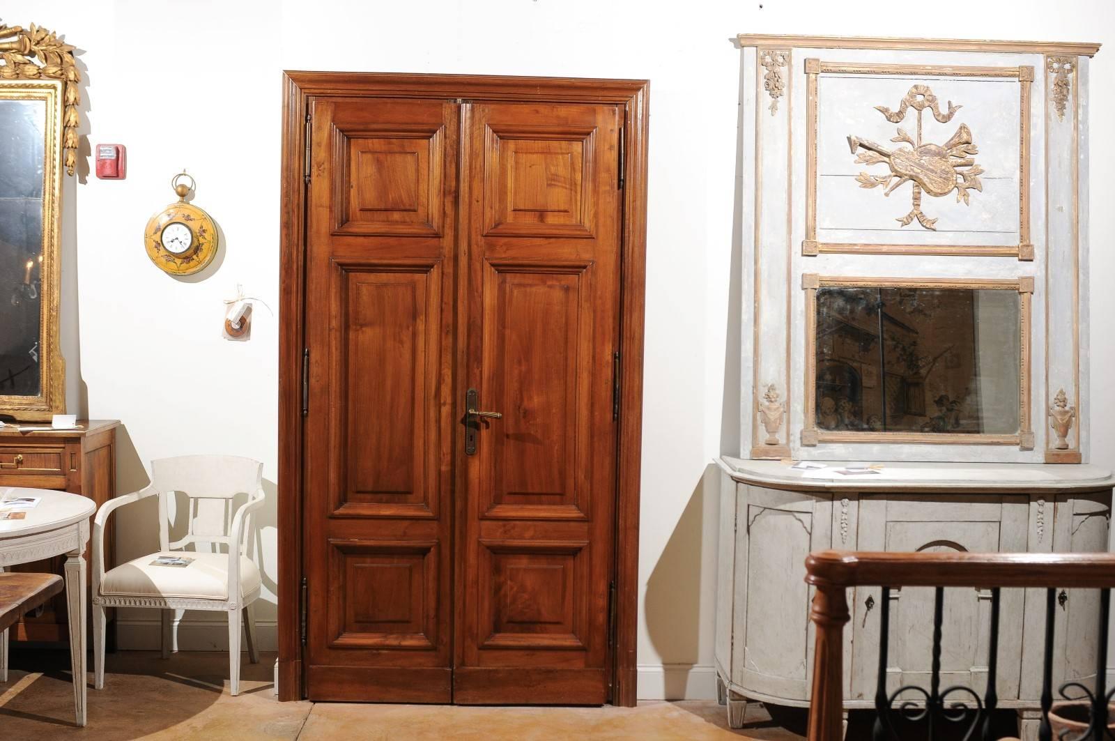 Pair of Italian Walnut Paneled Double Doors, circa 1870 with Custom Surround In Good Condition In Atlanta, GA