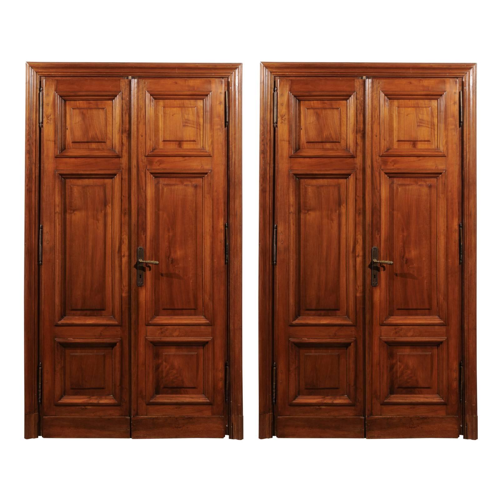 Pair of Italian Walnut Paneled Double Doors, circa 1870 with Custom Surround