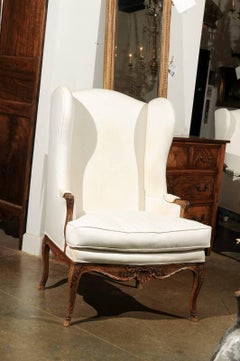 French Louis XV Style Early 19th Century Wingback Chair with Scalloped Skirt