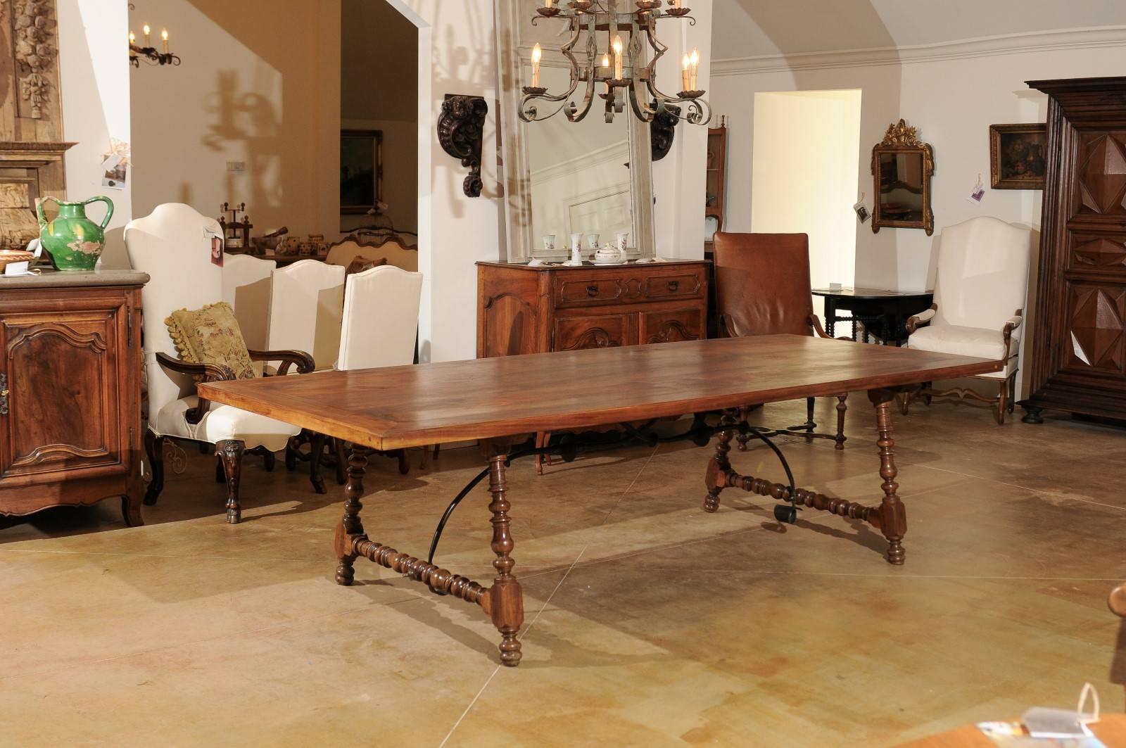 Carved Spanish 18th Century Walnut Fratino Table with Turned Legs and Iron Stretcher