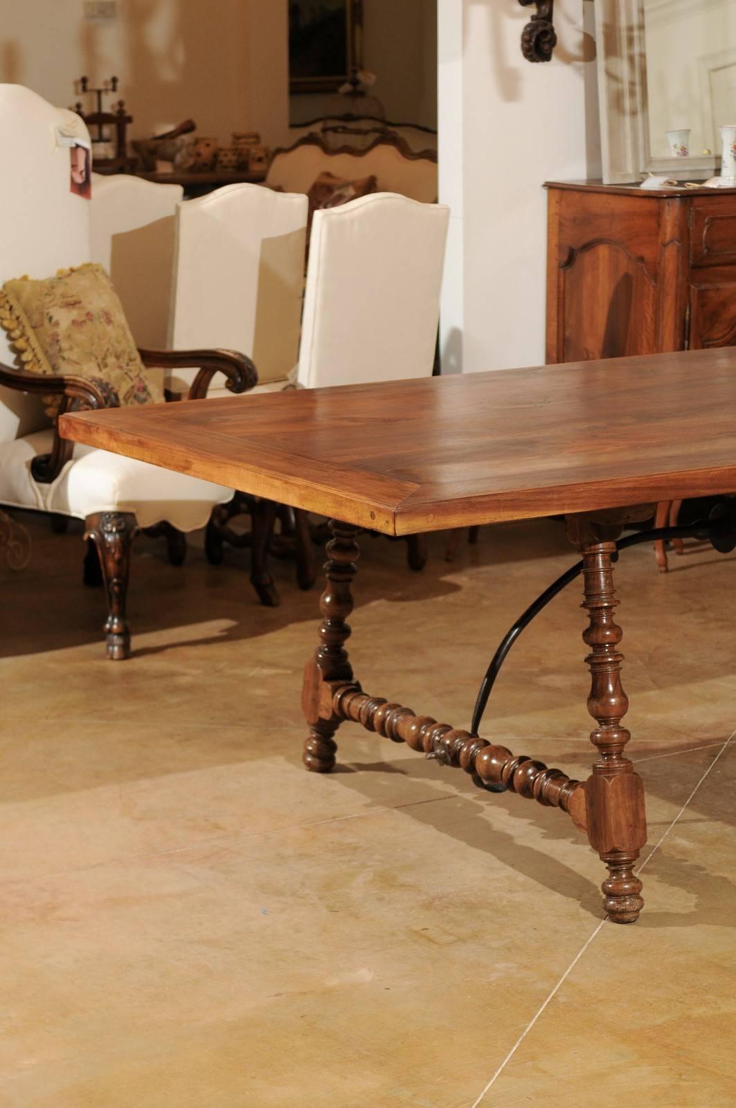 Spanish 18th Century Walnut Fratino Table with Turned Legs and Iron Stretcher In Excellent Condition In Atlanta, GA