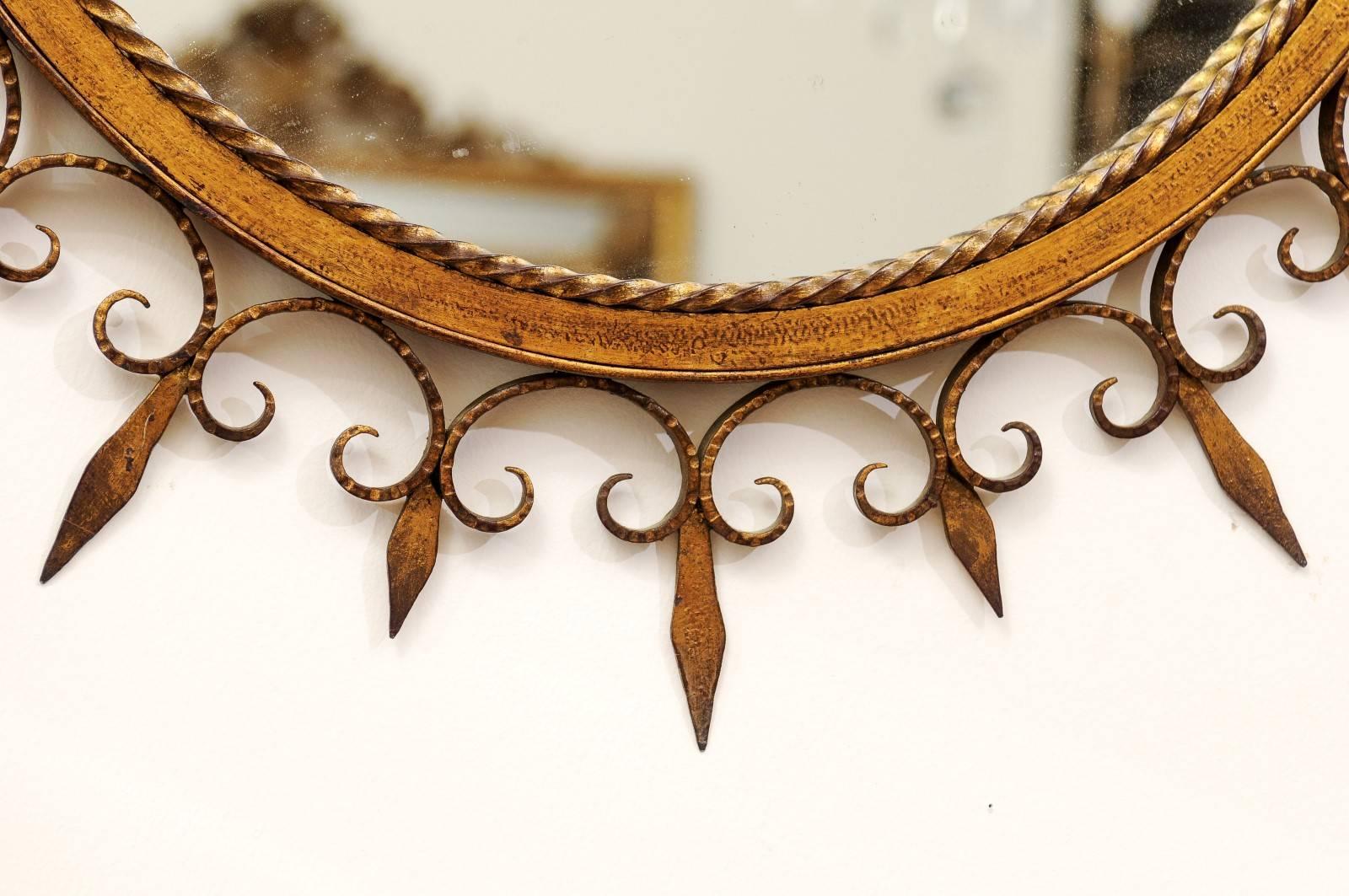 Gilt French Gilded Forged Iron Sunburst Mirror with Stylized Fleurs-de-Lys Motifs