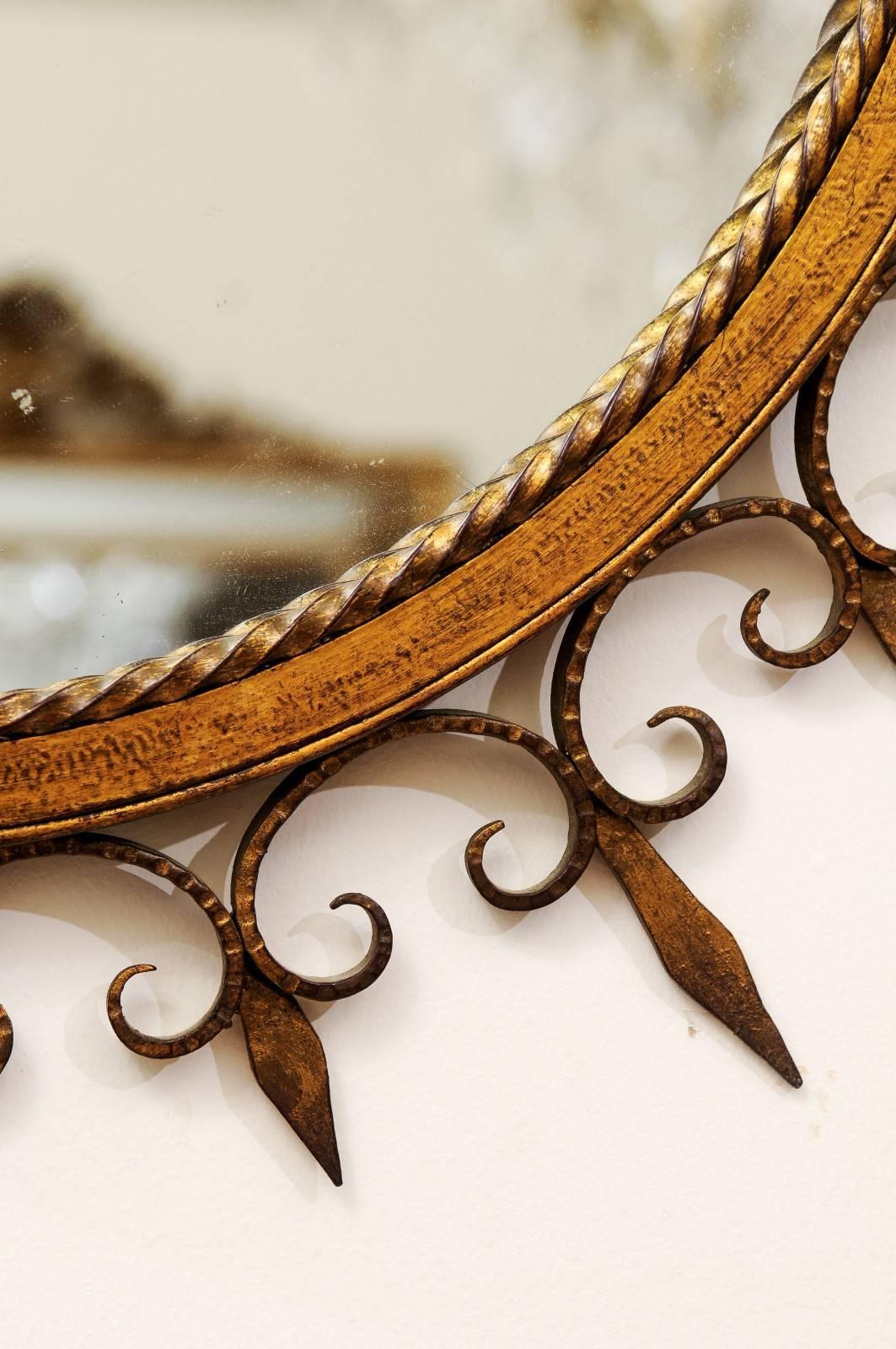 French Gilded Forged Iron Sunburst Mirror with Stylized Fleurs-de-Lys Motifs 2