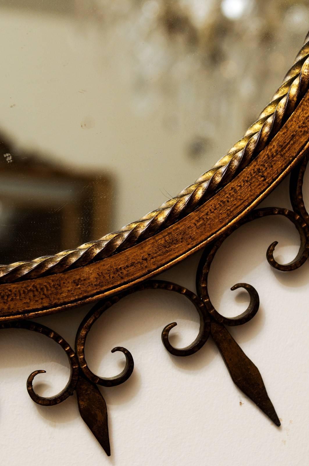 French Gilded Forged Iron Sunburst Mirror with Stylized Fleurs-de-Lys Motifs 1