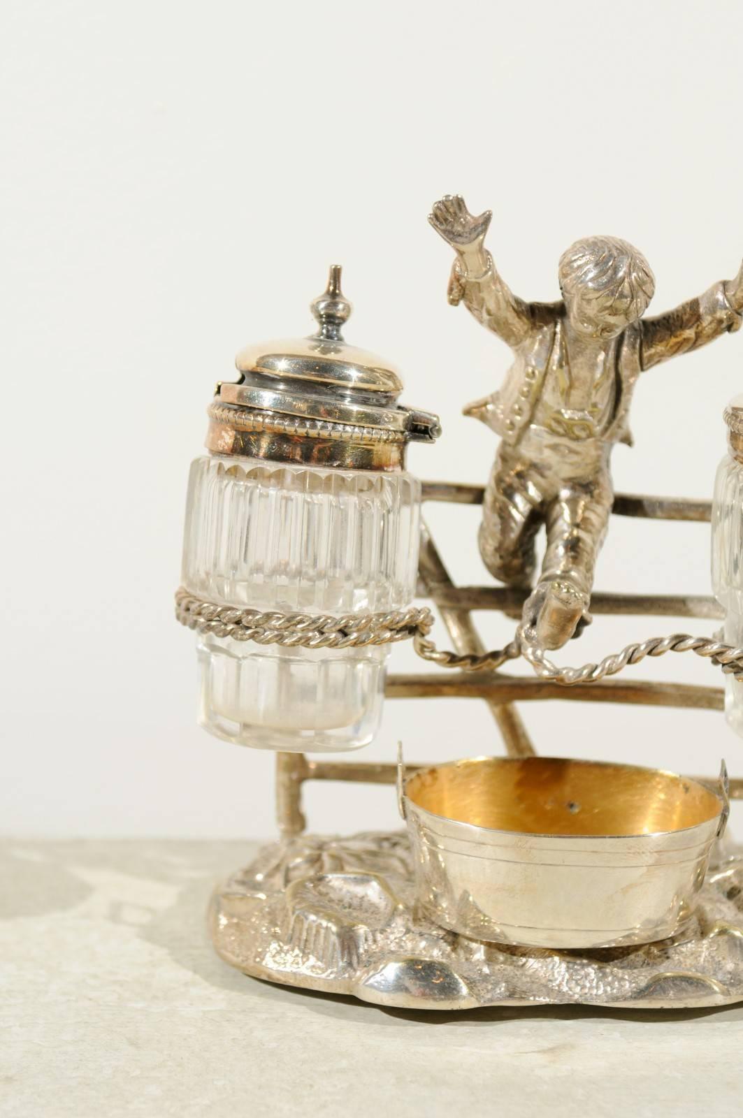 19th Century English Silver Plated Cruet Set of Young Boy Leaping in the Air, circa 1873 For Sale