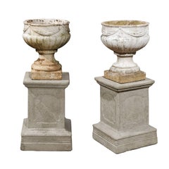 Pair of English Neoclassical Style Reconstituted Stone Jardinières on Plinths