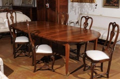French Late 19th Century Walnut Extension Dining Room with Five Leaves