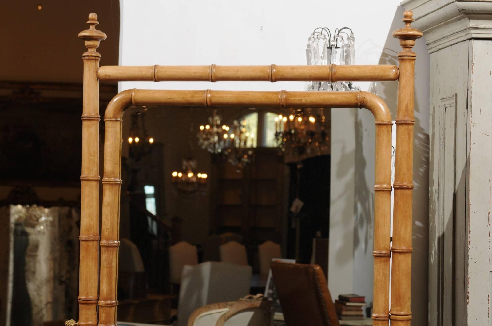 19th Century French Freestanding Faux-Bamboo Cheval Mirror with Saber Legs from the 1870s