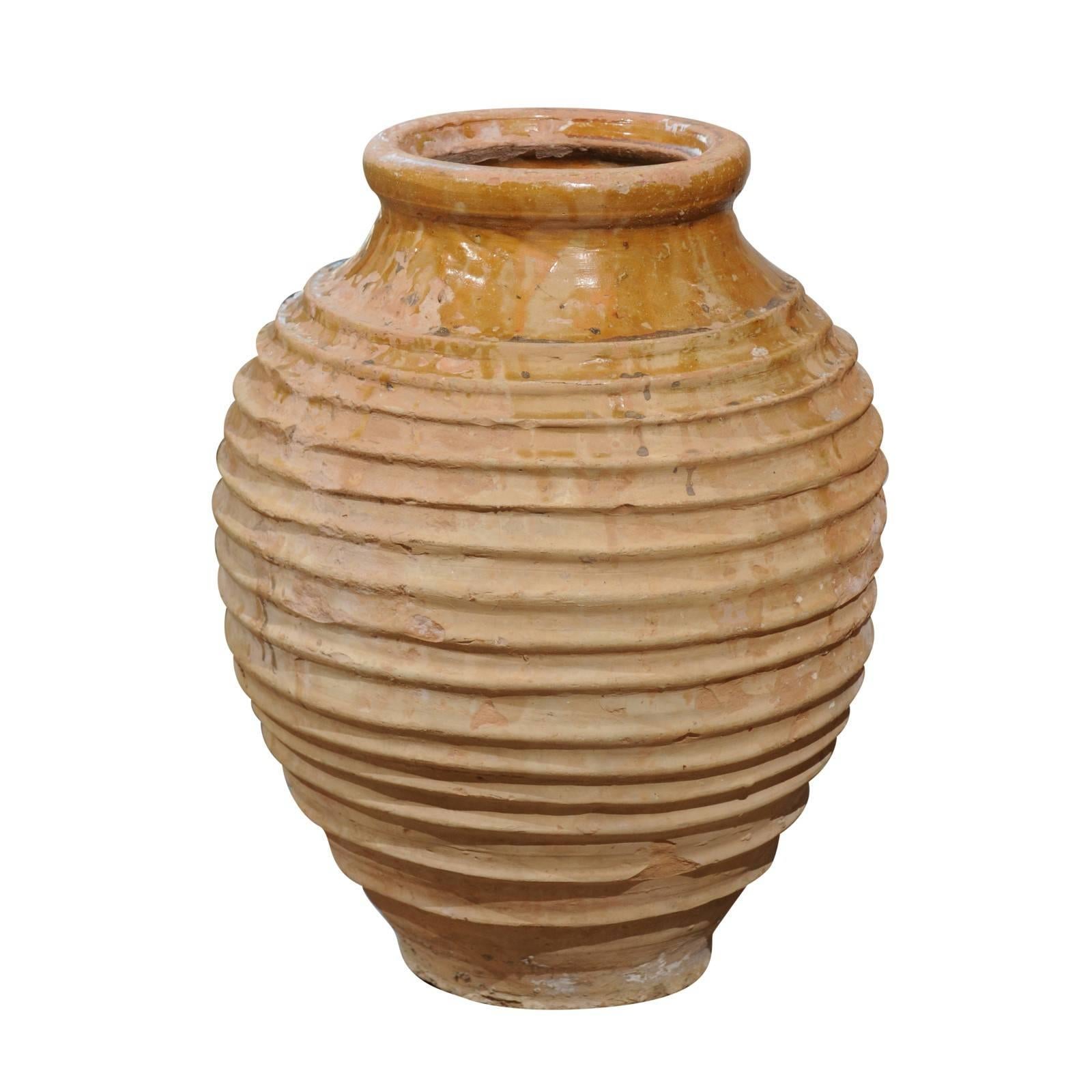 Greek Early 19th Century Round Terracotta Olive Jar with Ribbed Body and Glaze