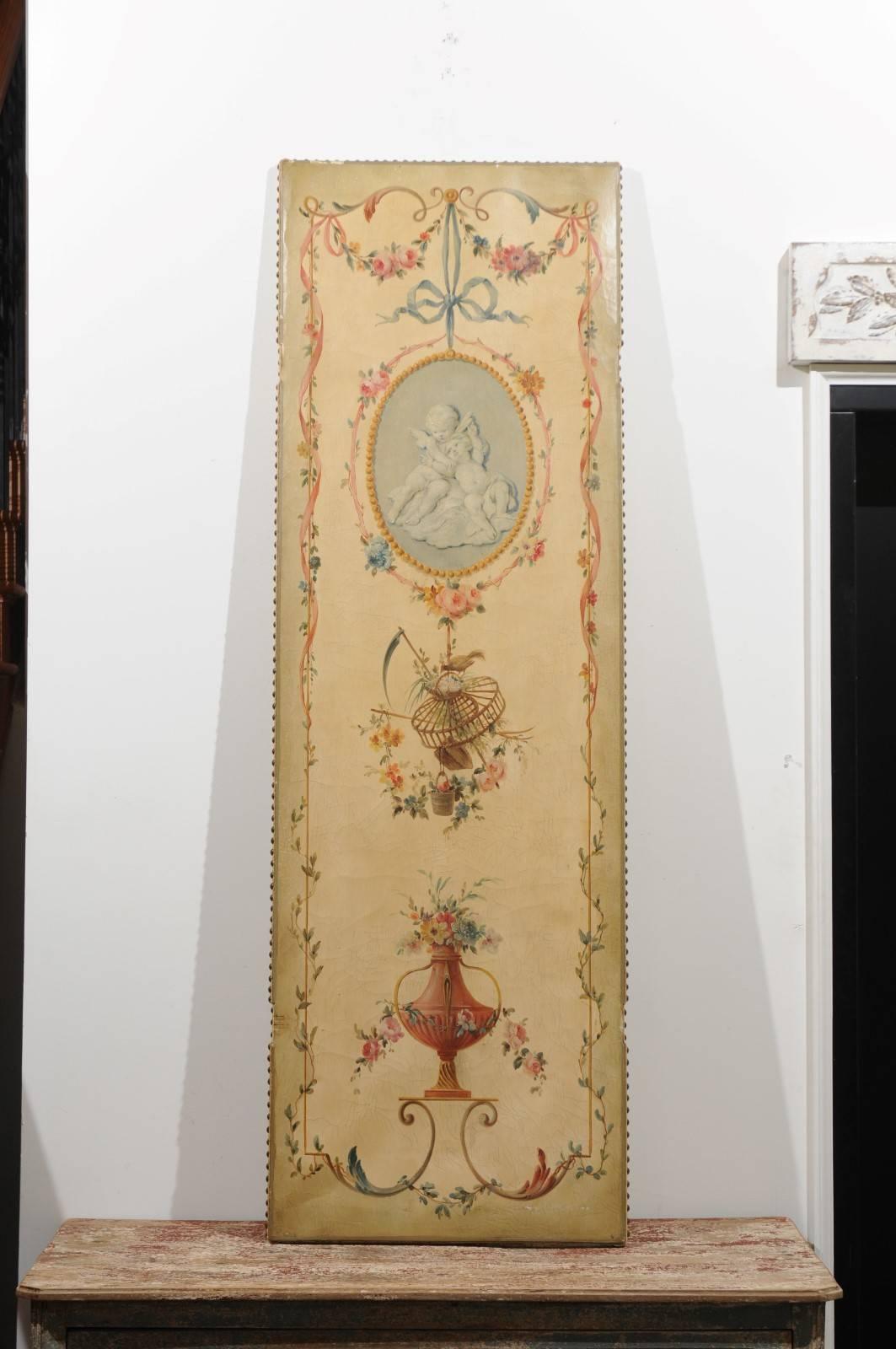 An Italian single oil on canvas painted panel from the 19th century. This exquisite Italian decorative panel features a delicate hand-painted décor, depicting two cherubs surrounded by a ribbon-tied beaded medallion, below which are represented