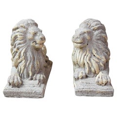 Pair of English 20th Century Composition Reclining Lion Sculptures with Patina