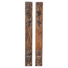 Pair of French 1890s Carved Wooden Panels with Ribbon-Tied Bouquets and Urns