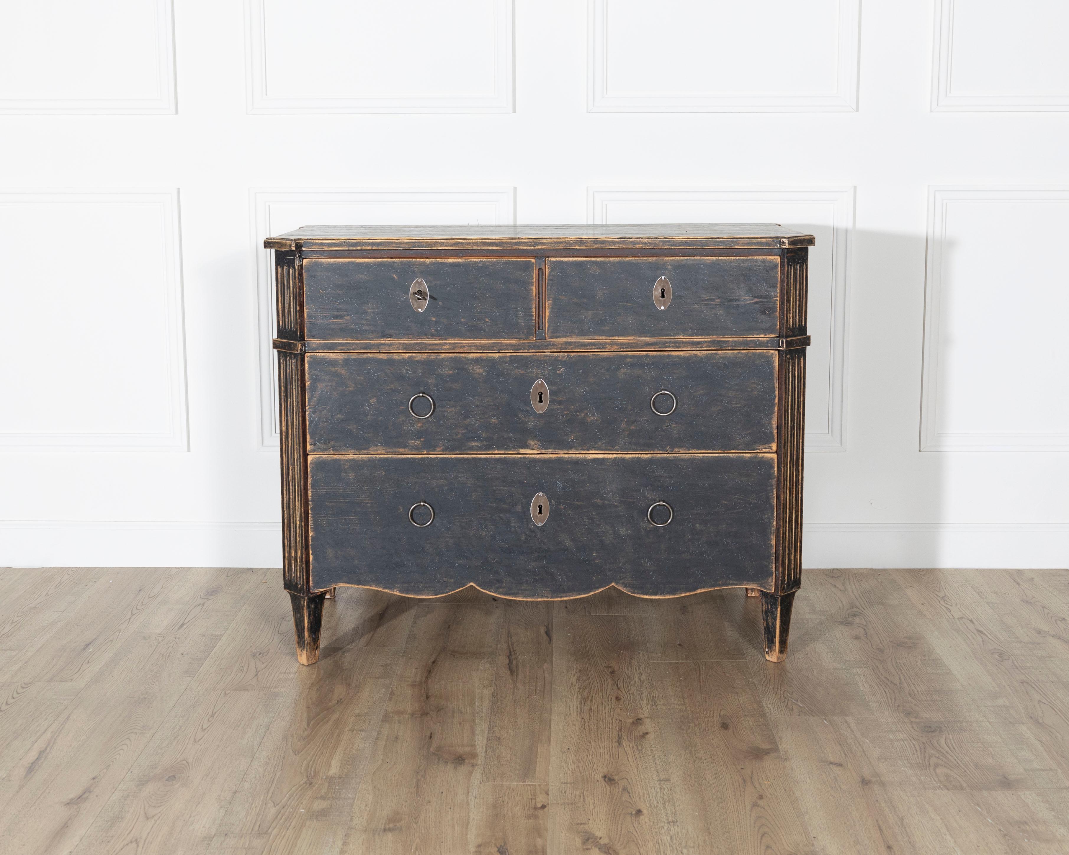 An authentic late 18th-century Swedish Gustavian period commode, circa 1780, featuring its original structure with a later black-painted finish. This striking piece showcases the elegant simplicity characteristic of Gustavian design, clean lines,