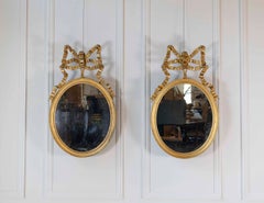Pair of Swedish 20th Century Ribbon-Crested Mirrors