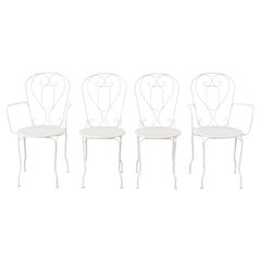 Lot de quatre chaises de jardin françaises en fer forgé du XIXe siècle
