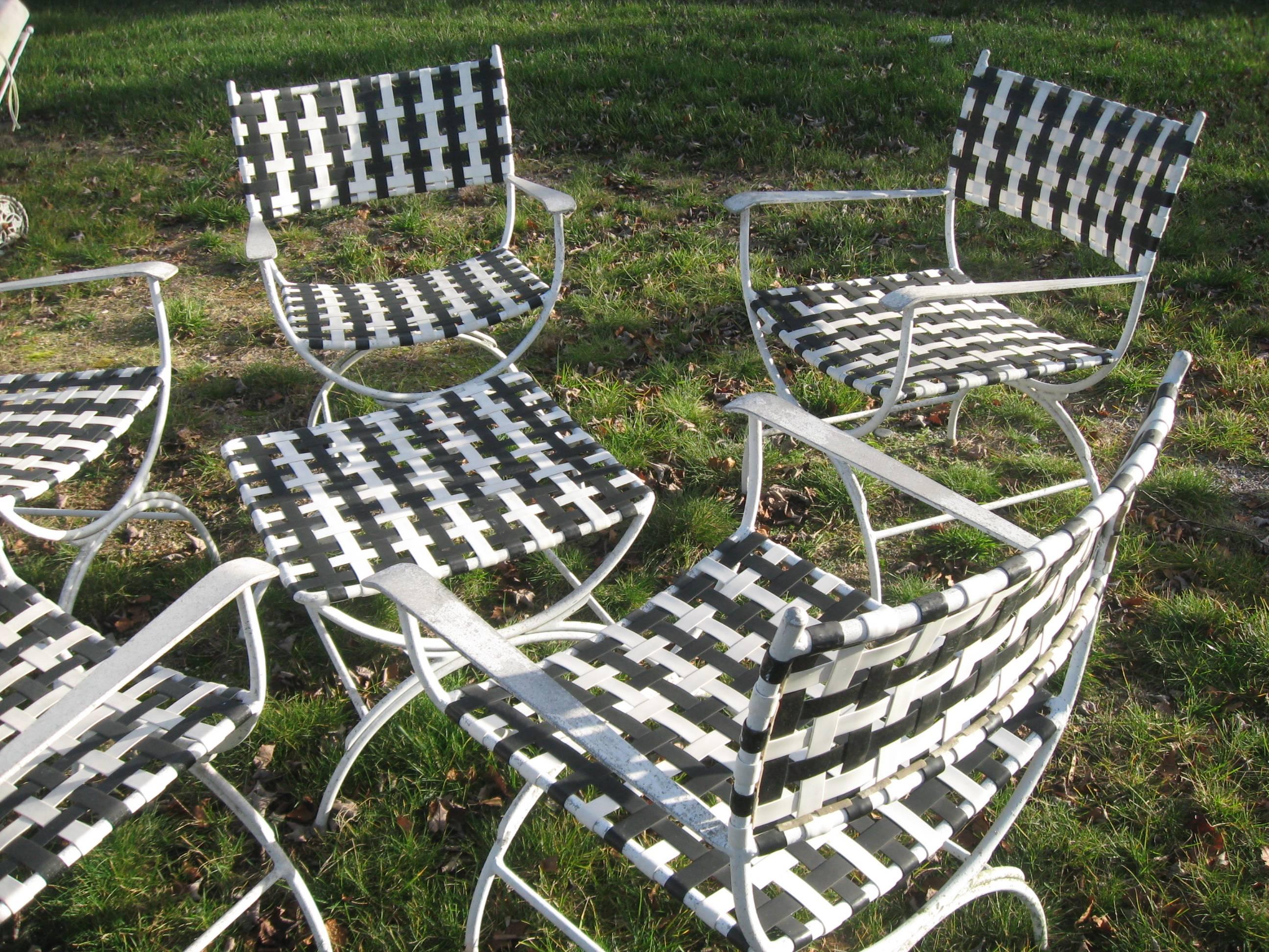 1950s five-piece, five chairs, foot stool/table aluminium with black and white webbing
from a Southampton Estate. Once belonging to Z Gabor.