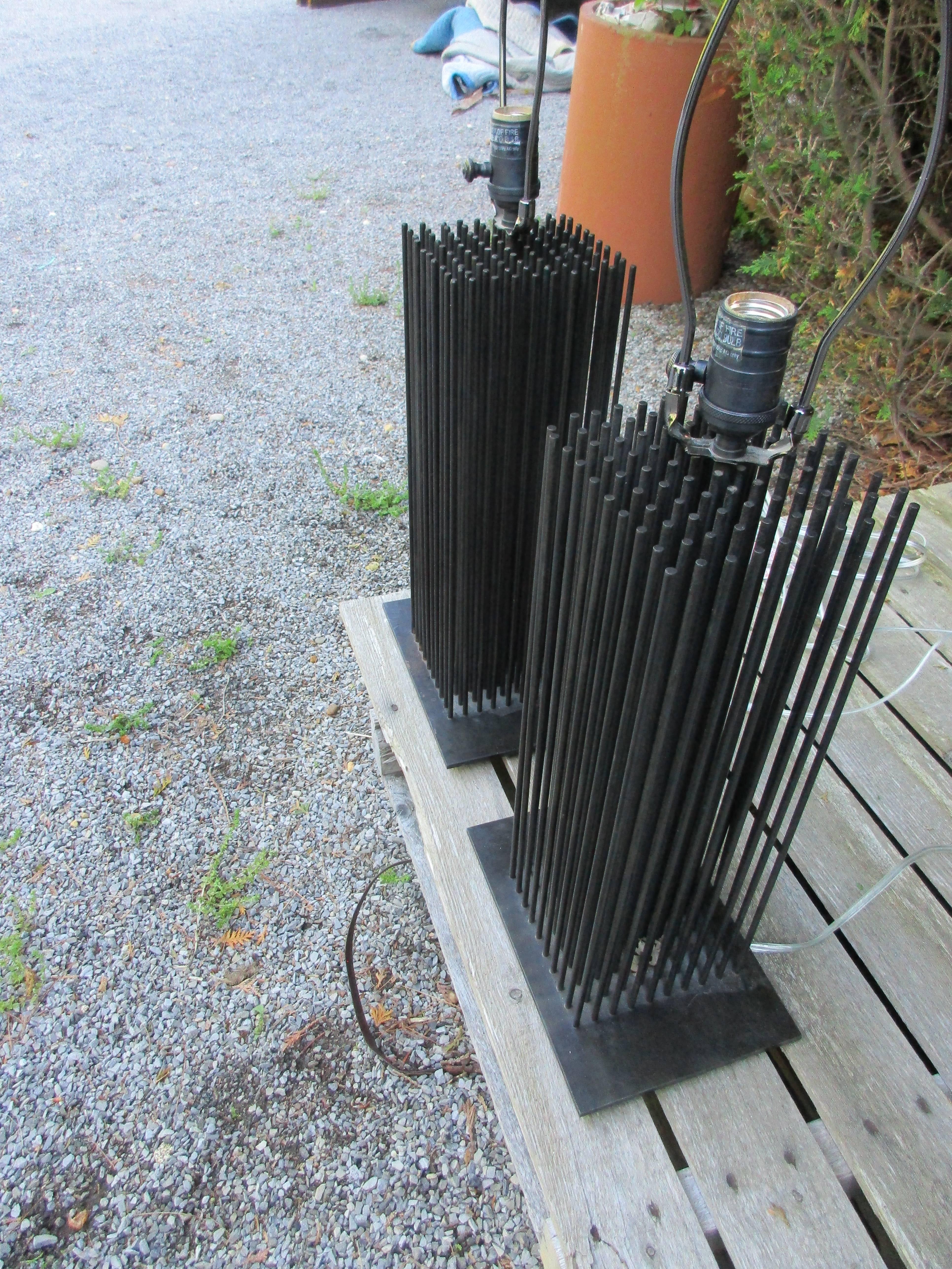 Pair of Brutalist lamps with iron black rods.
